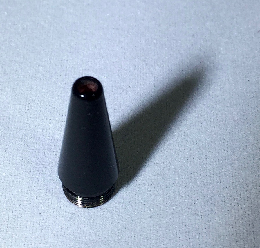 The nose cone continues the taper from the barrel and matches the top pieces of the pen.