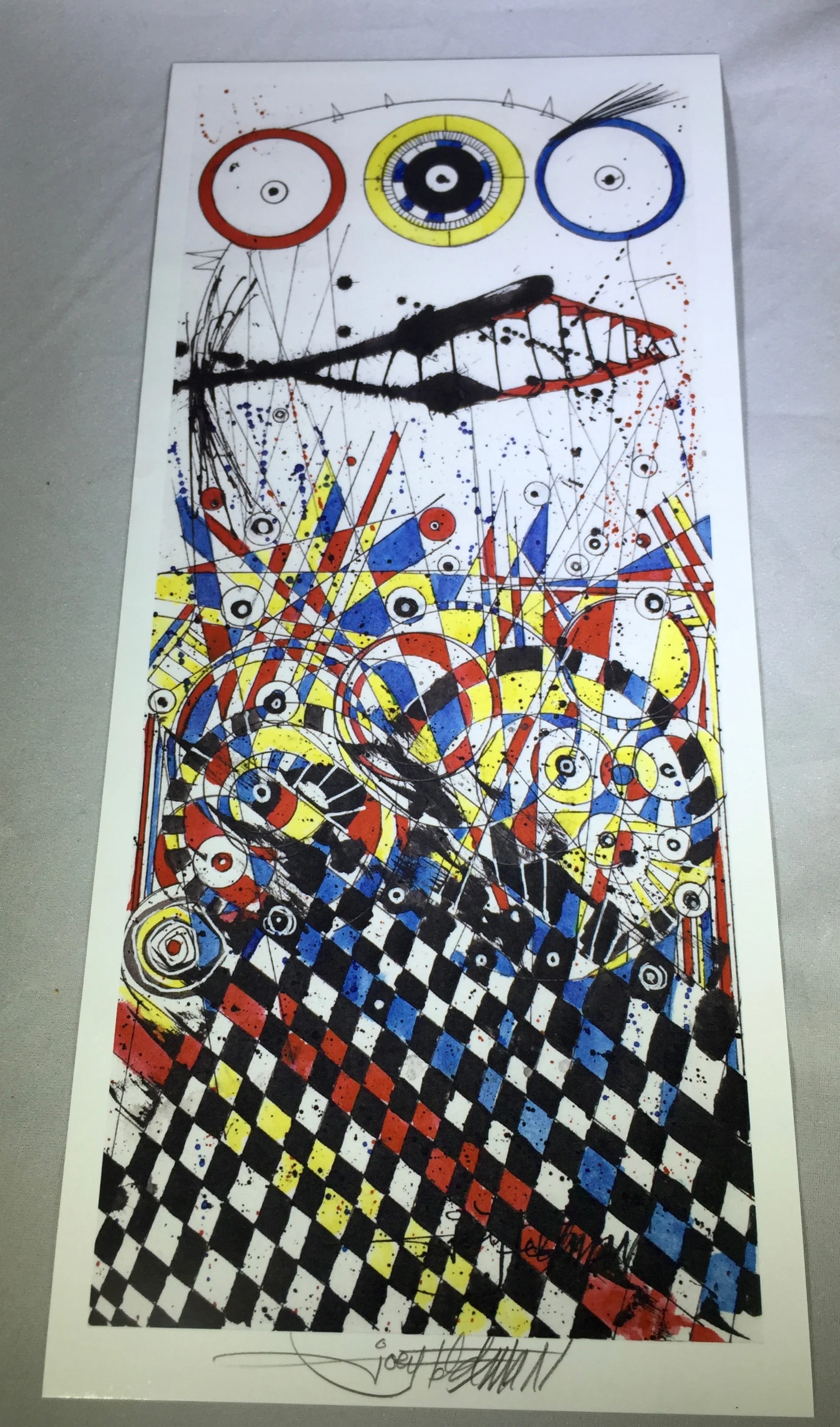 The signed print is only included with the red clip pen.