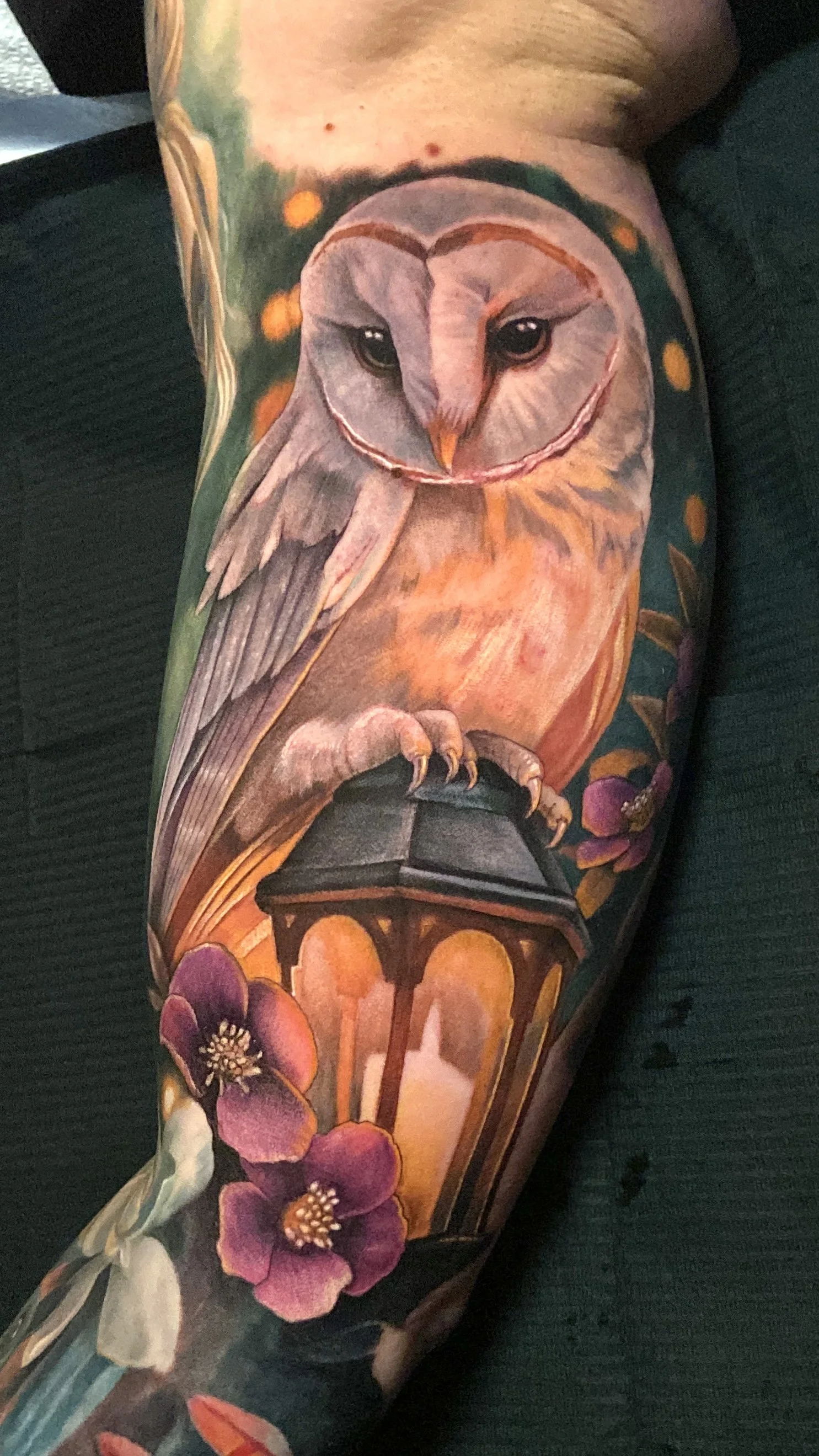 Adriana-hallow-tattoo-Melanated-skin-color-realism-nyc-owl-lantern-romantic.JPG