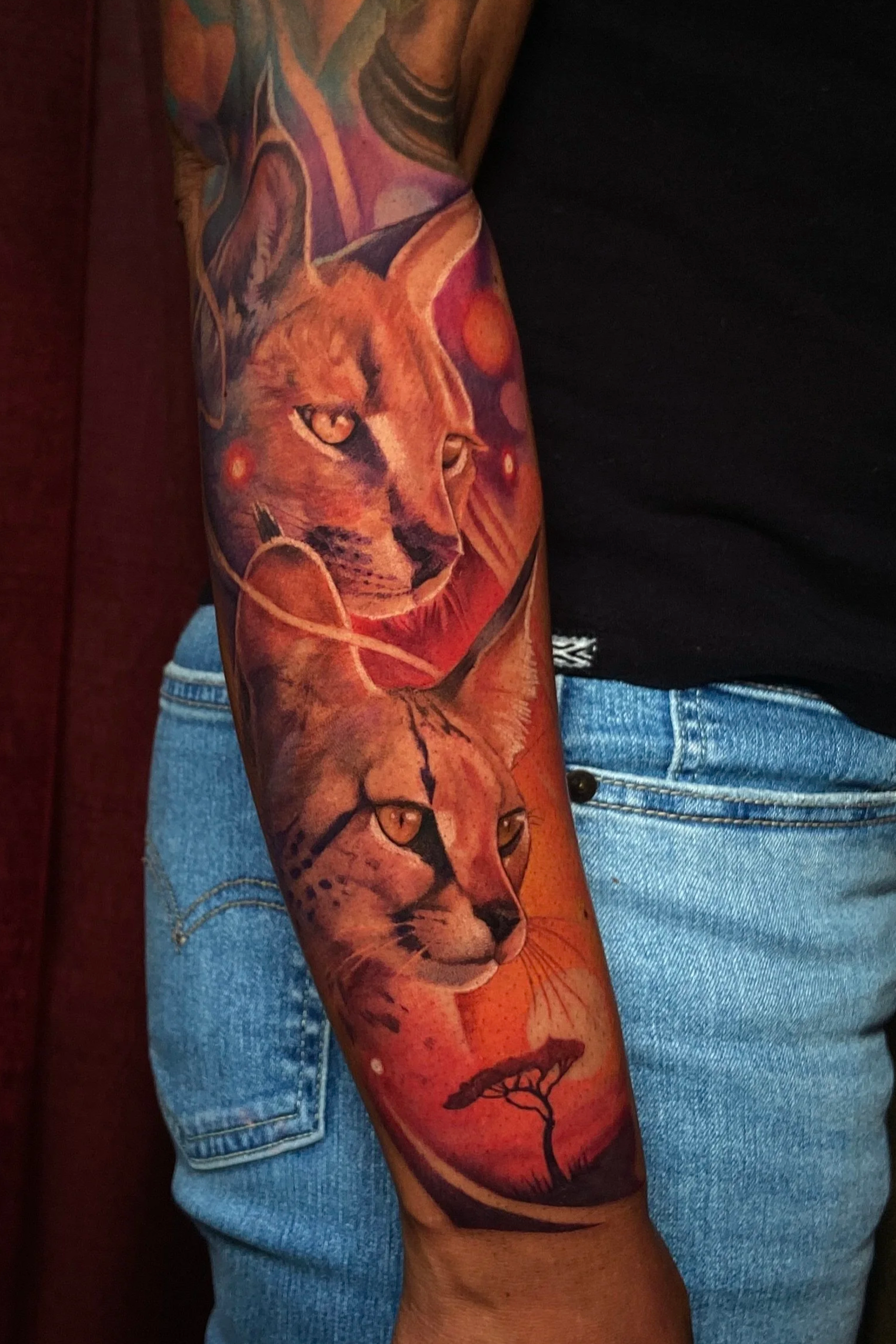 Adriana-Hallow-Tattoo-Melanated-skin-color-africa-cats-realism-nyc.png