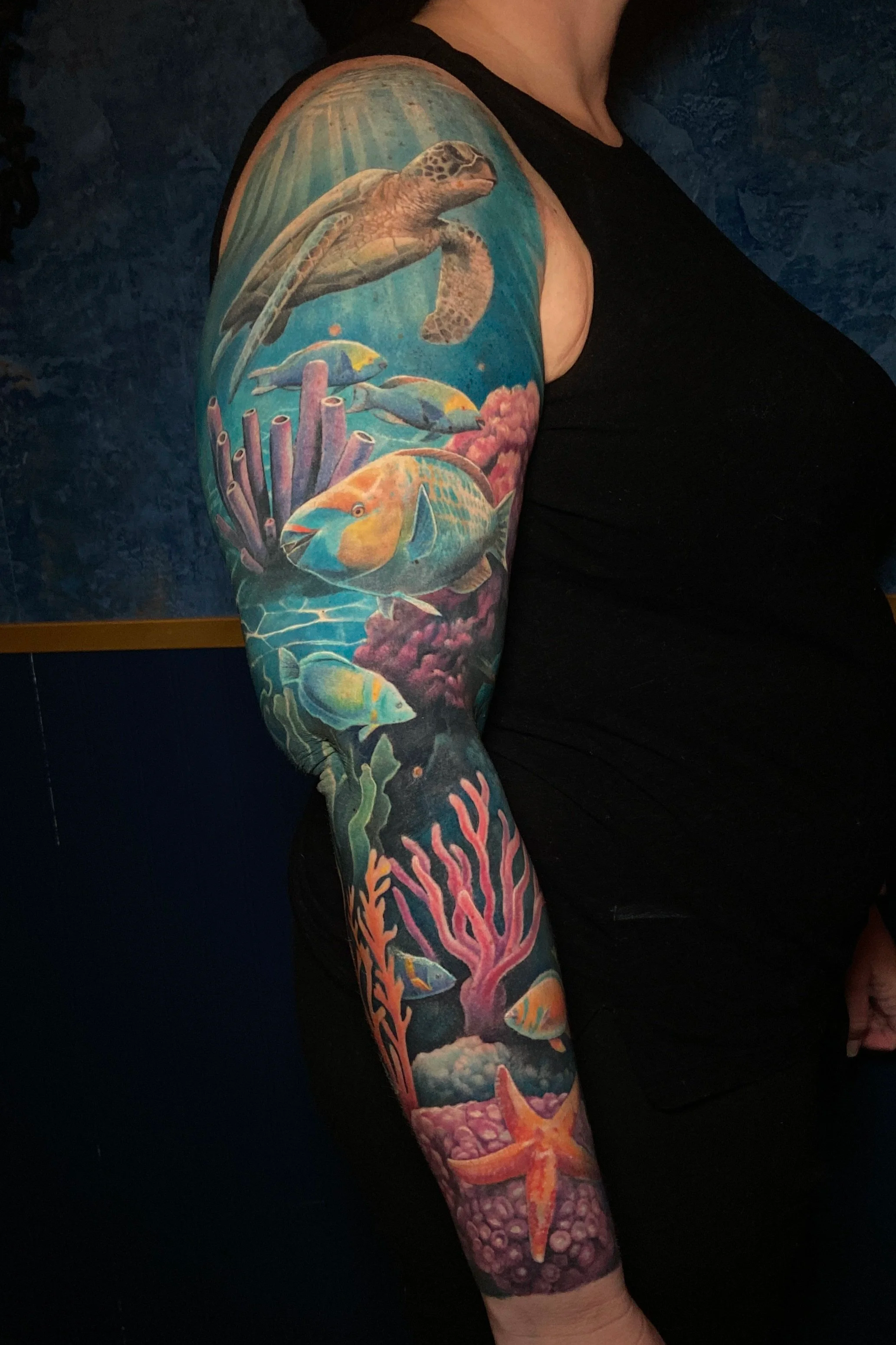 Adriana-hallow-tattoo-Melanated-skin-color-realism-nyc-coral-reef-under-water-sleeve.png