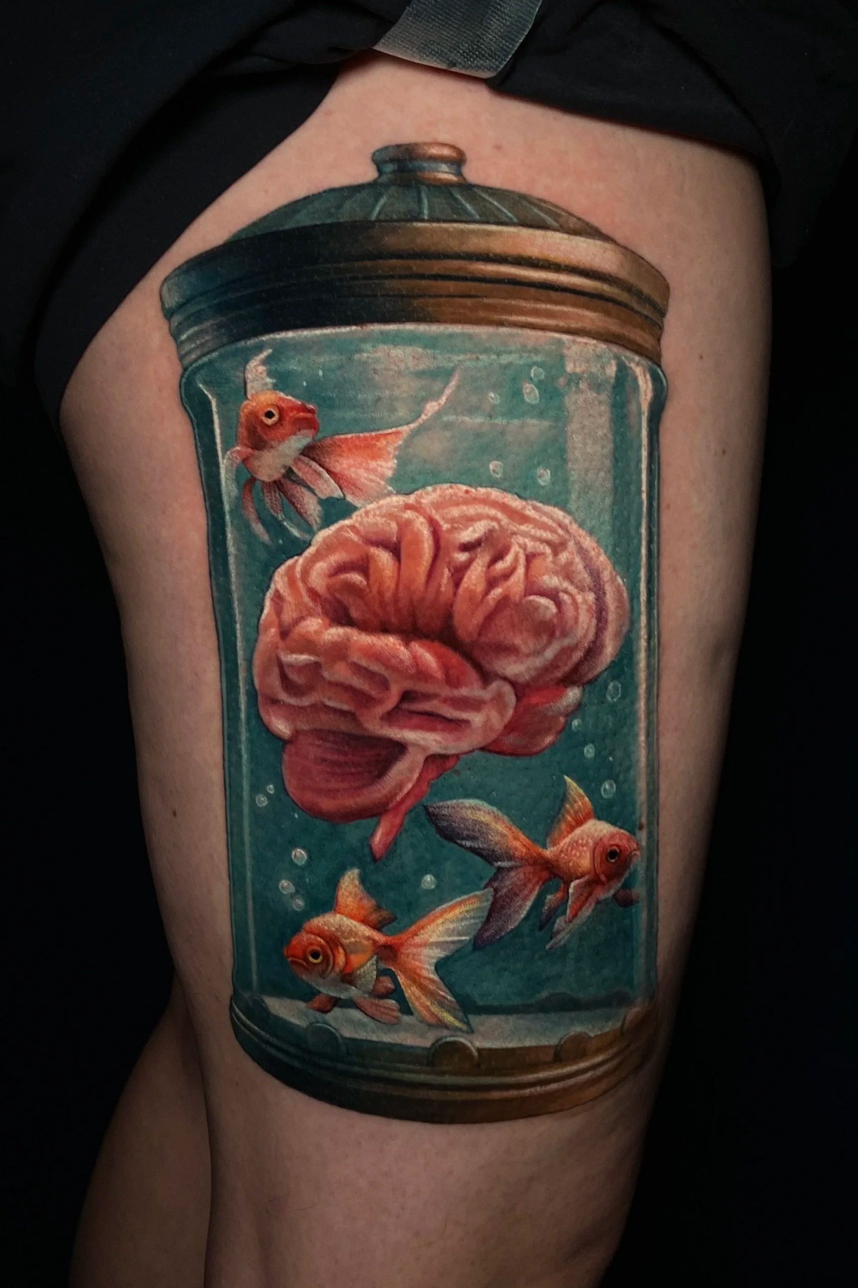Adriana-hallow-tattoo-Melanated-skin-color-realism-nyc-fish-tank-human-brain.png