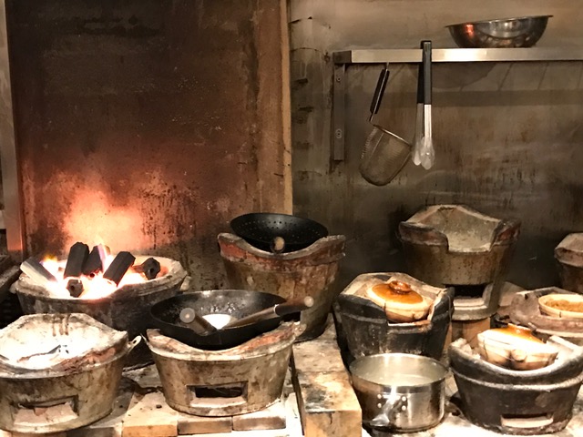 On first glance, the stove area looks like a rural roadside food stand