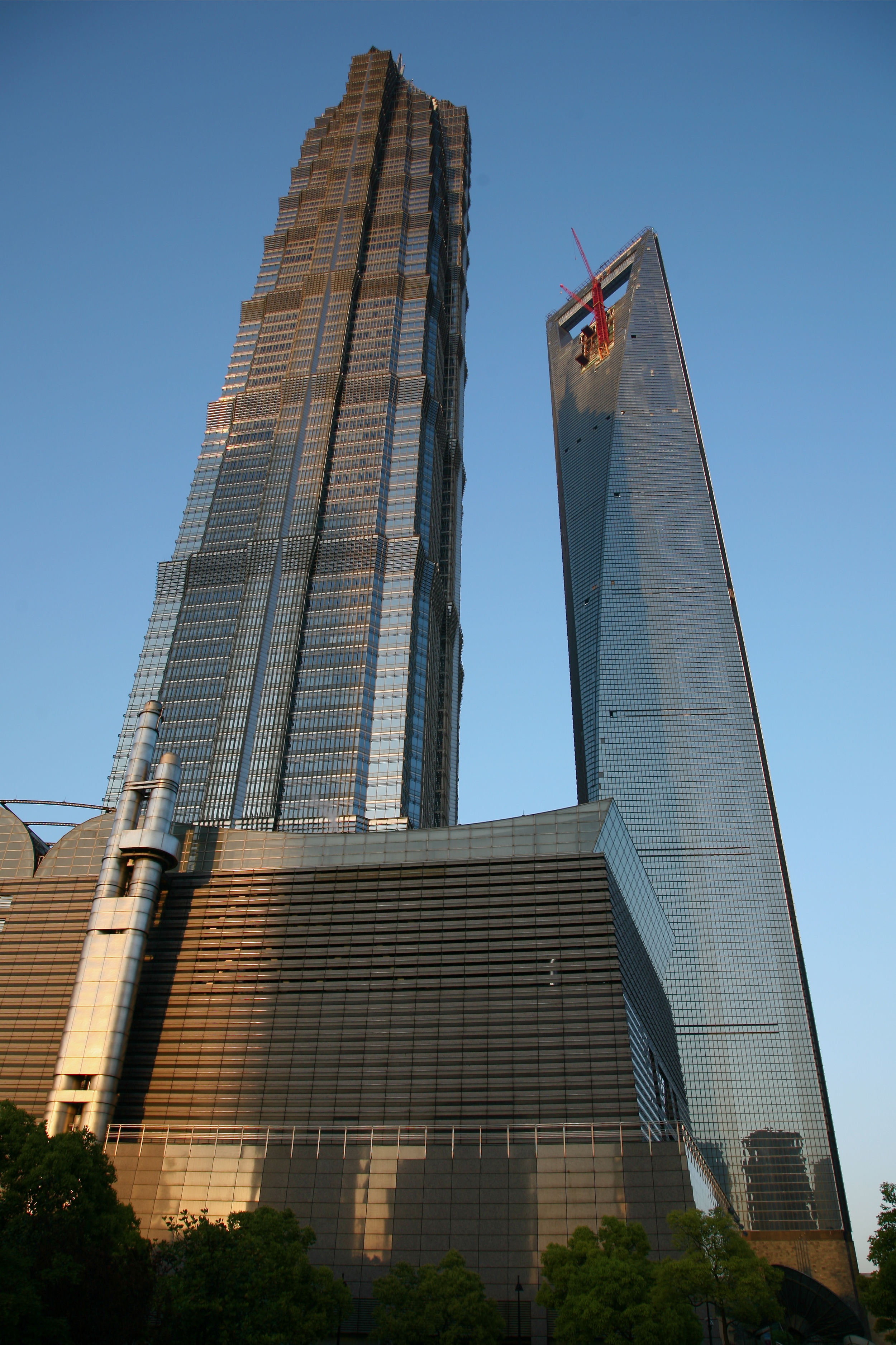  L: Jinmao Tower (88 flrs), home to our hotel.&nbsp; R: World Financial Centre being built (101 flrs) 