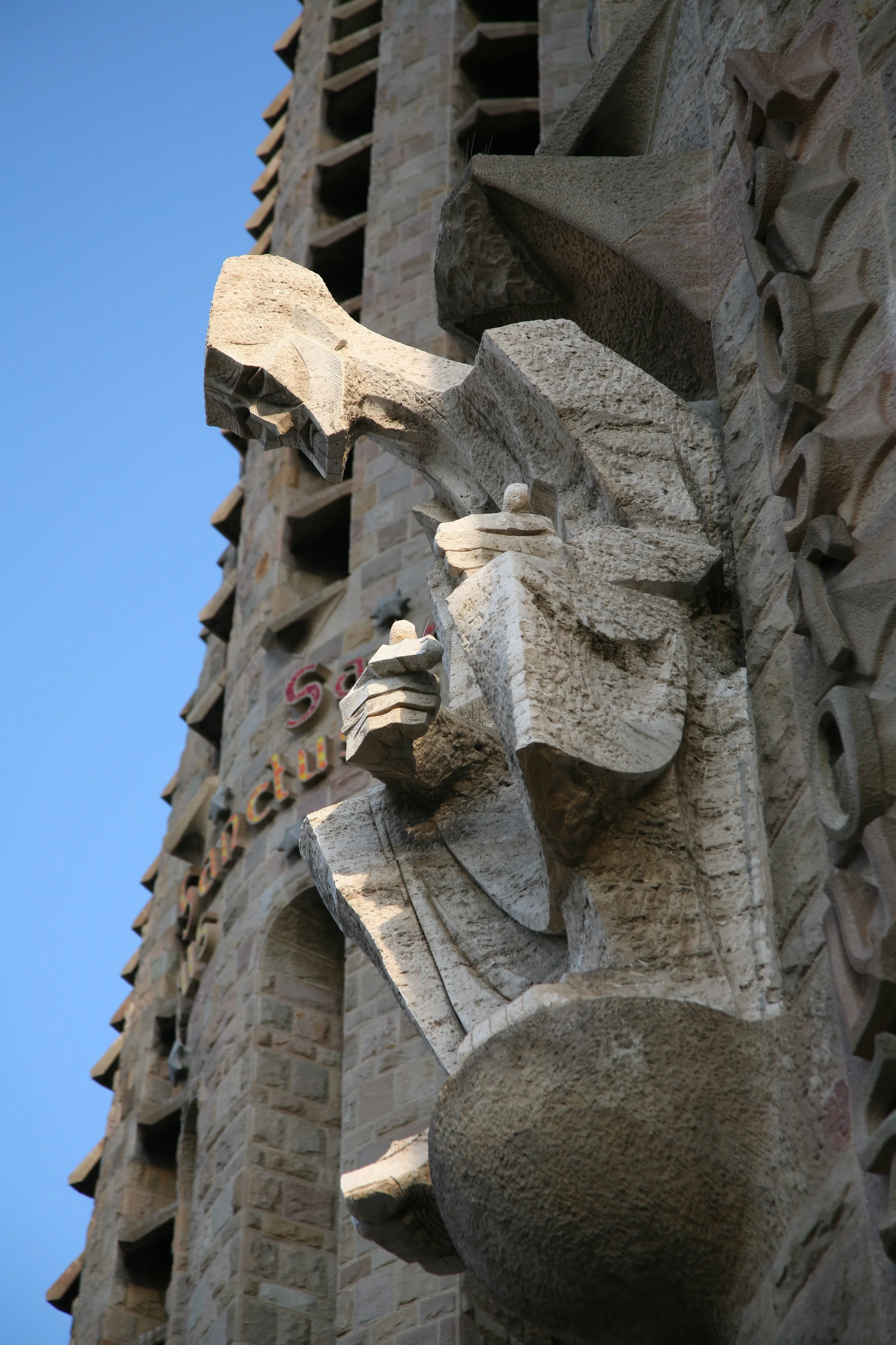  One a number of figures on the newer side of the church up close 