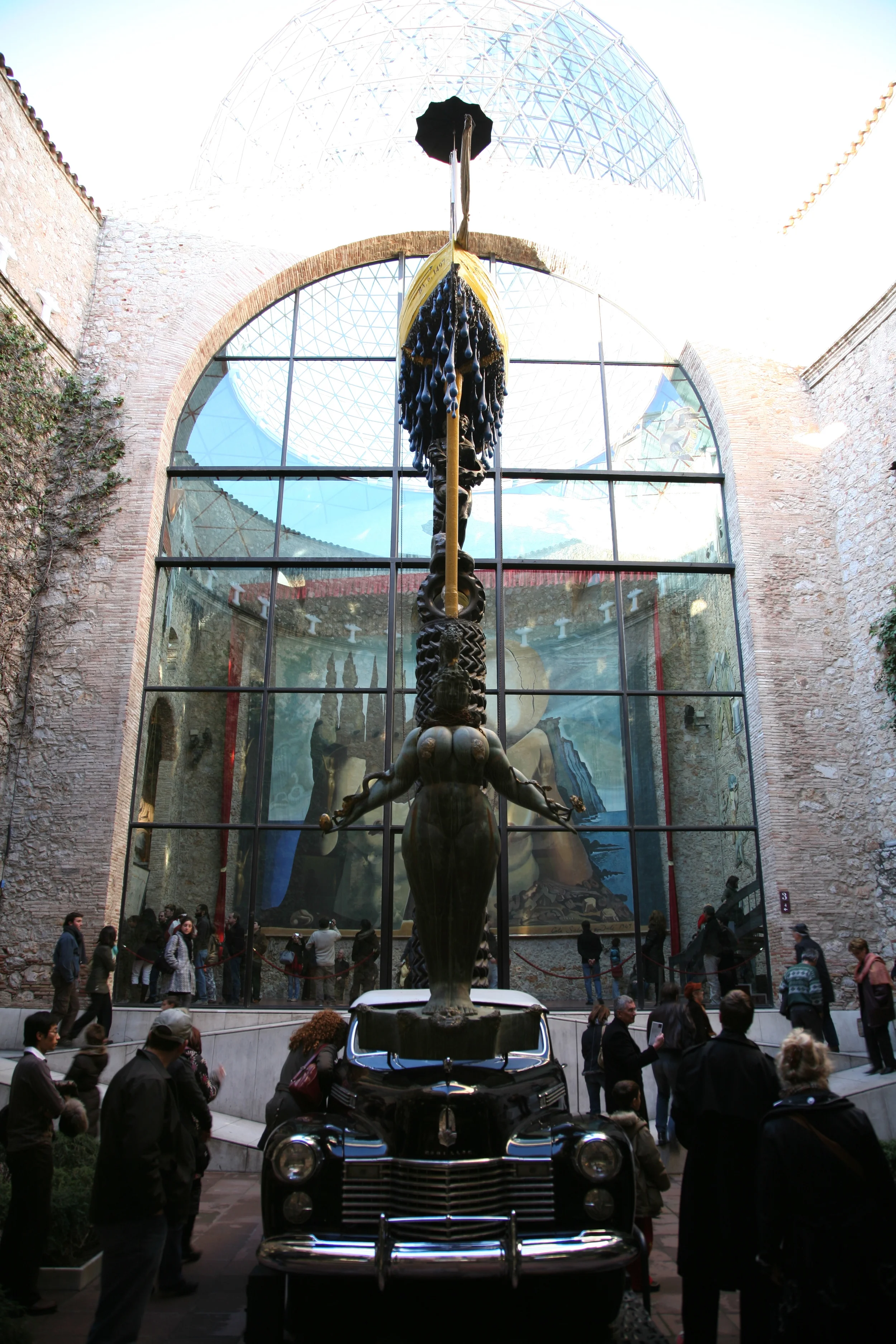  The exterior courtyard car and statue.&nbsp; Feed the car a euro and get green rain inside the car 