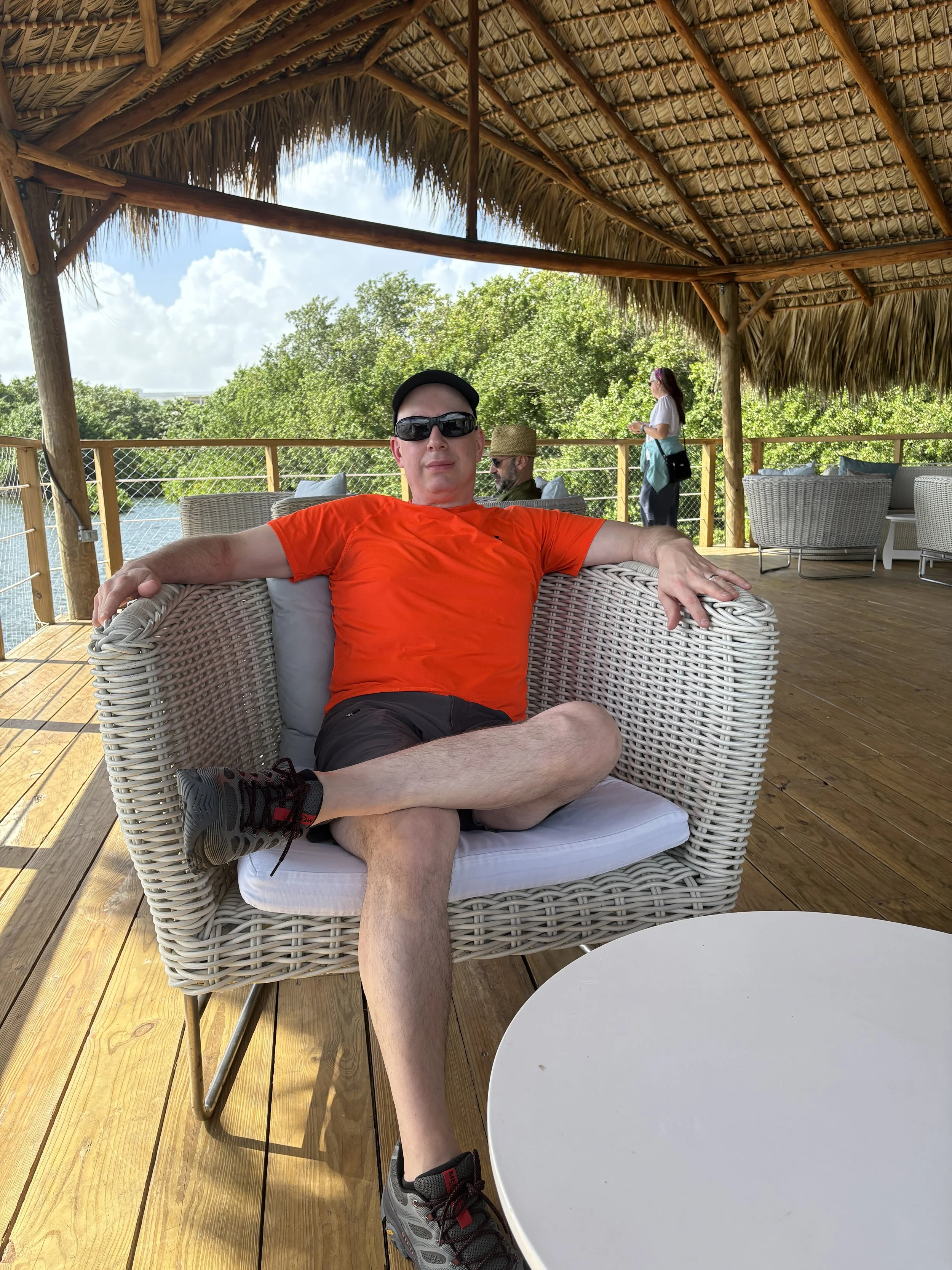  Tom relaxing in the shade of the covered portion of the walkway 