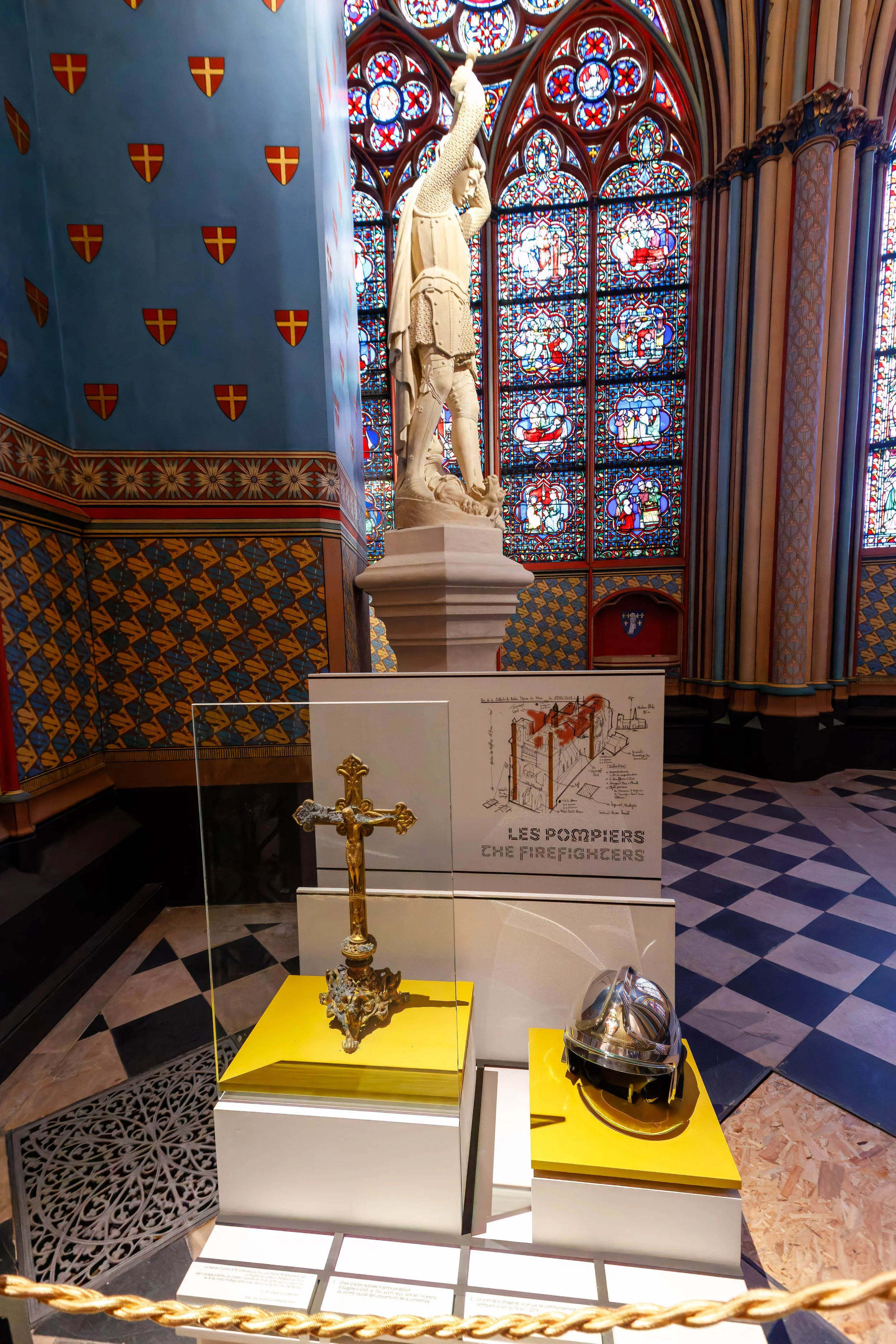  Memorial to the Firefighters and a photo of the damage 