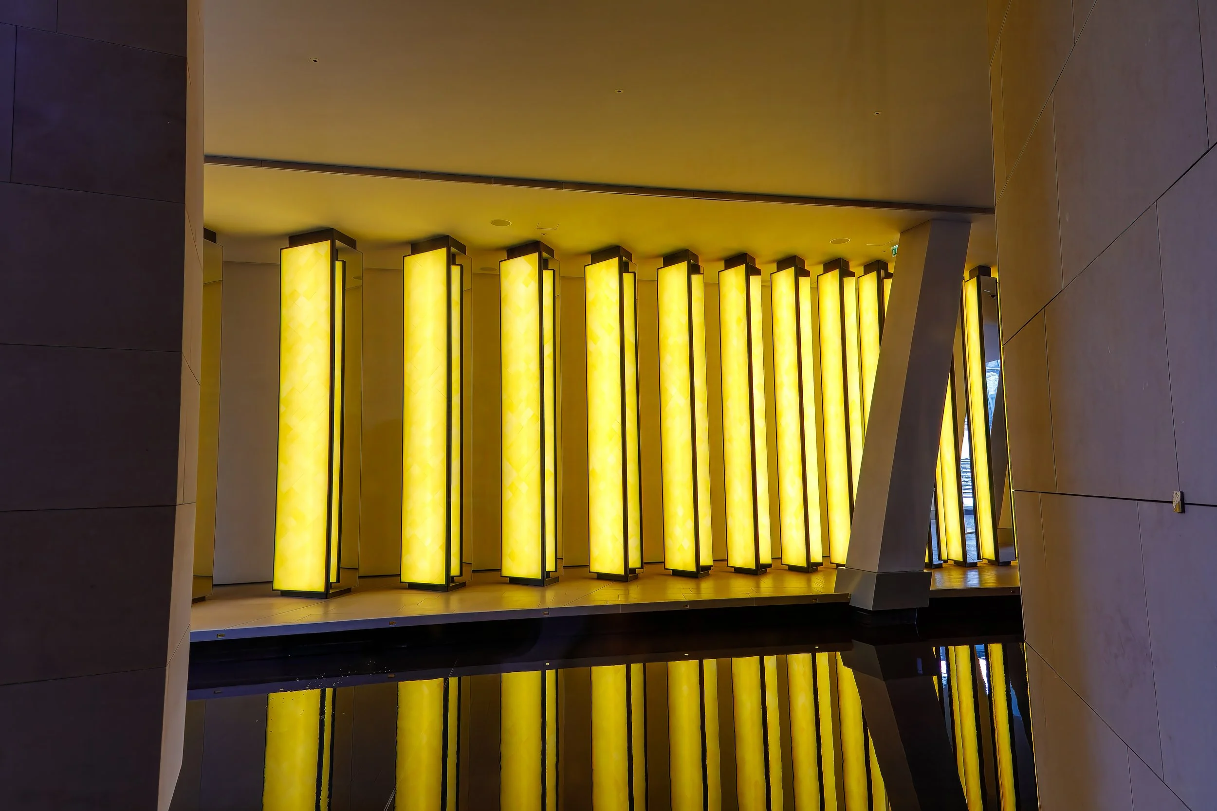  A light walkway or art built into the outer facade of the building 