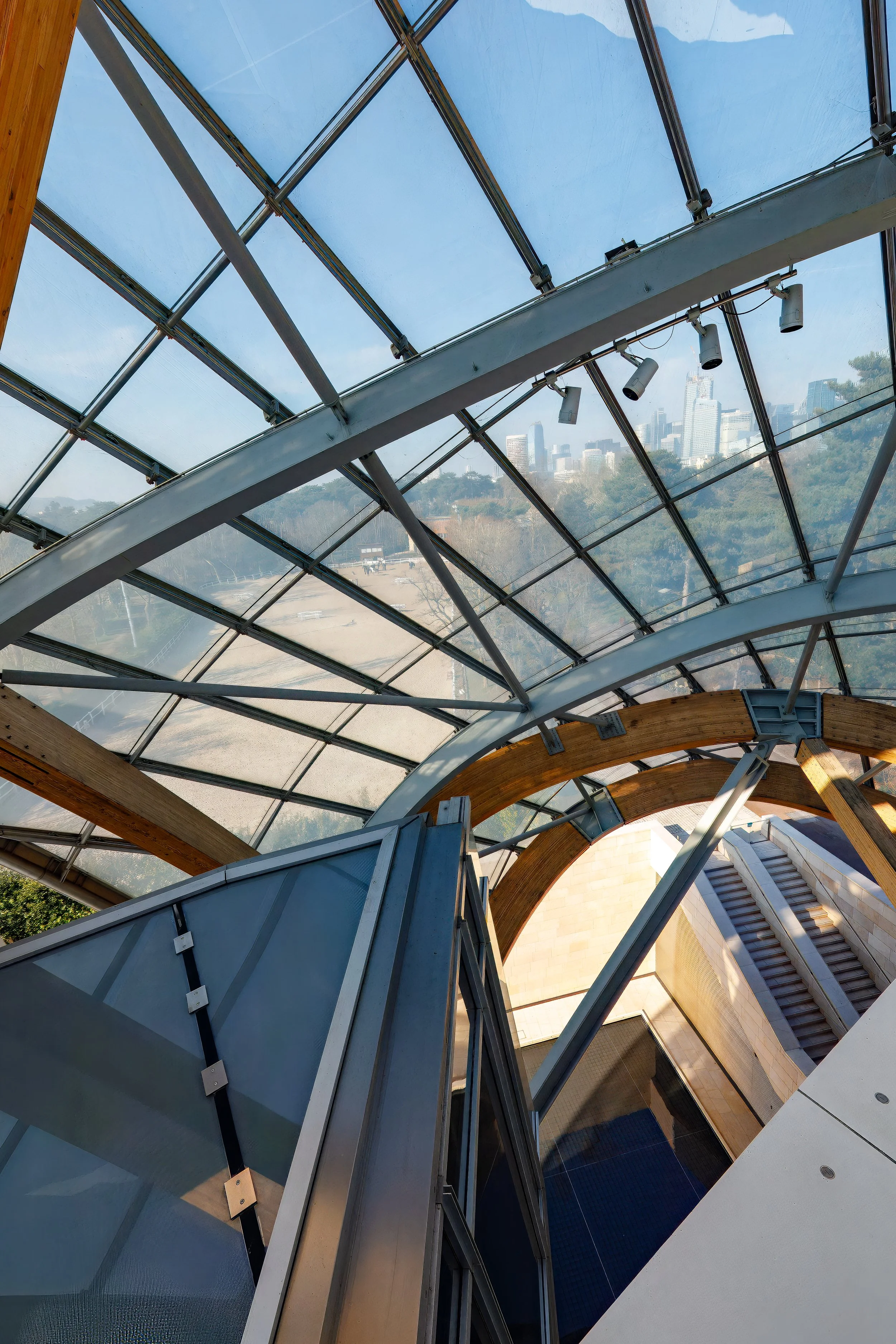  View of La Defense towers in the background through the glass roof 