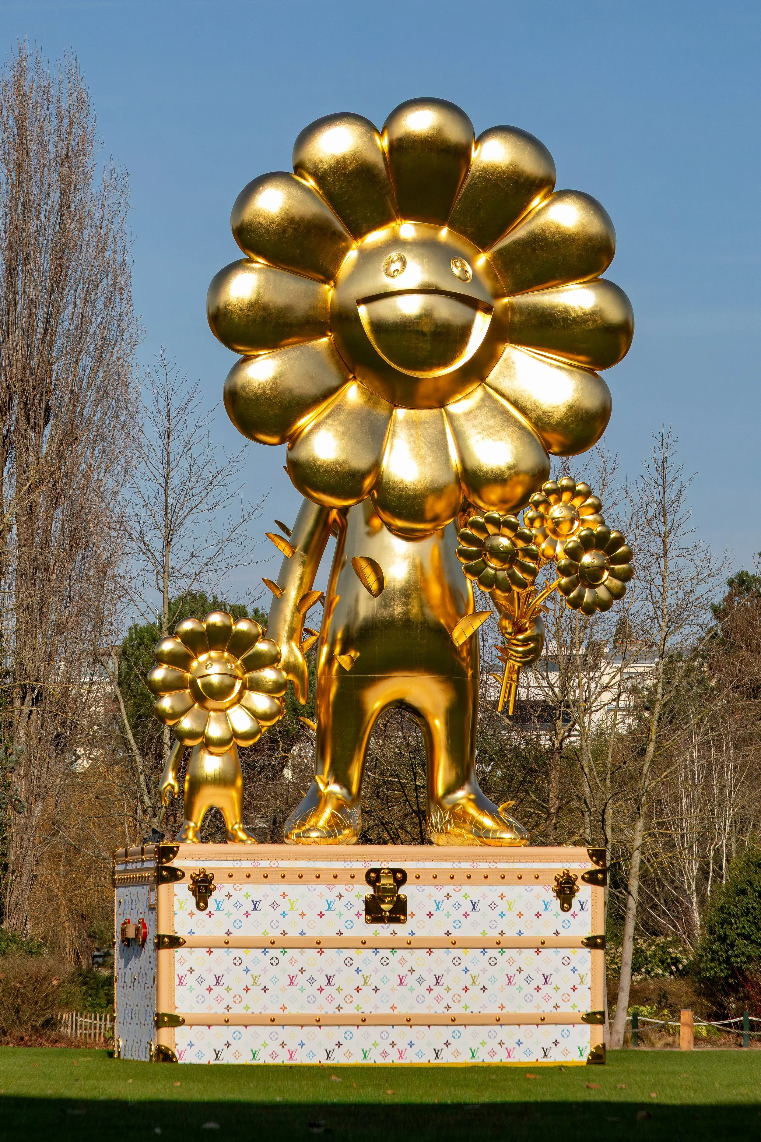  Flower Parent and Child (2021) - Takashi Murakami sculpture created as a symbol of hope during COVID sitting on a Louis Vuitton trunk 