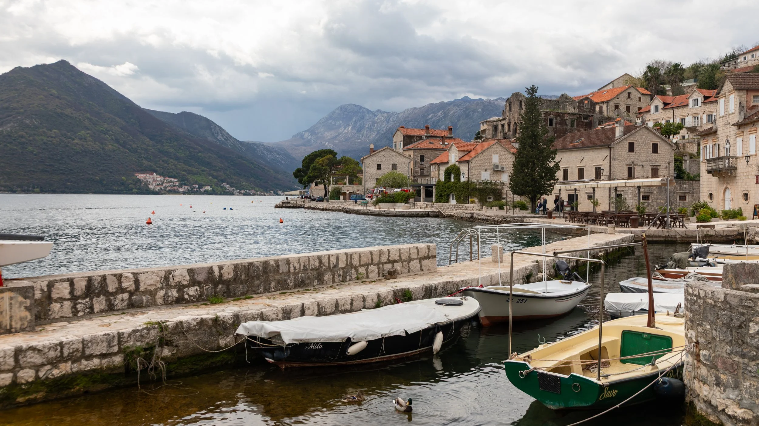  A number of boats recruiting business to take to the Monastery and Church islands 