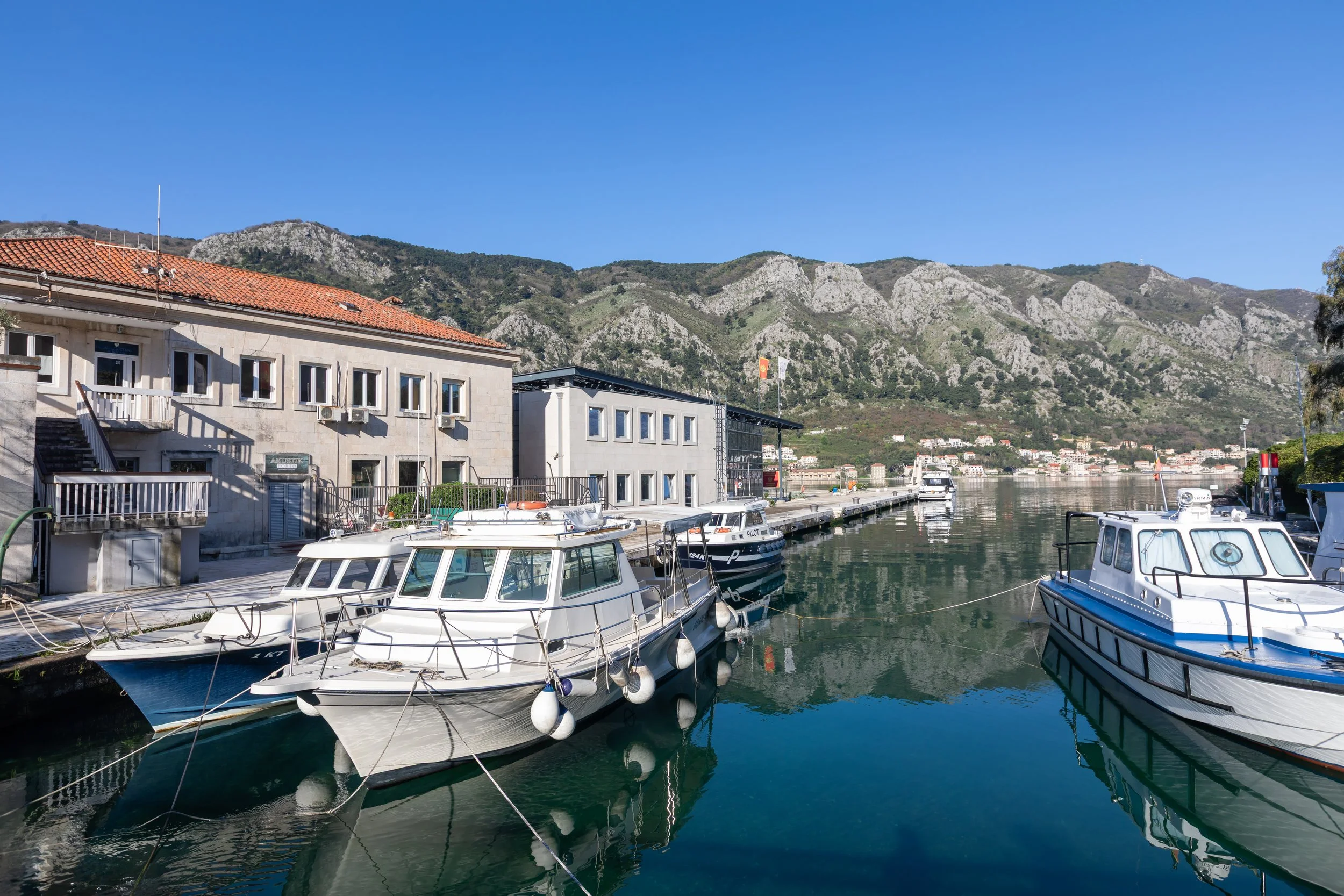  Blue skies make their first appearance for the morning along Kotor Bay 