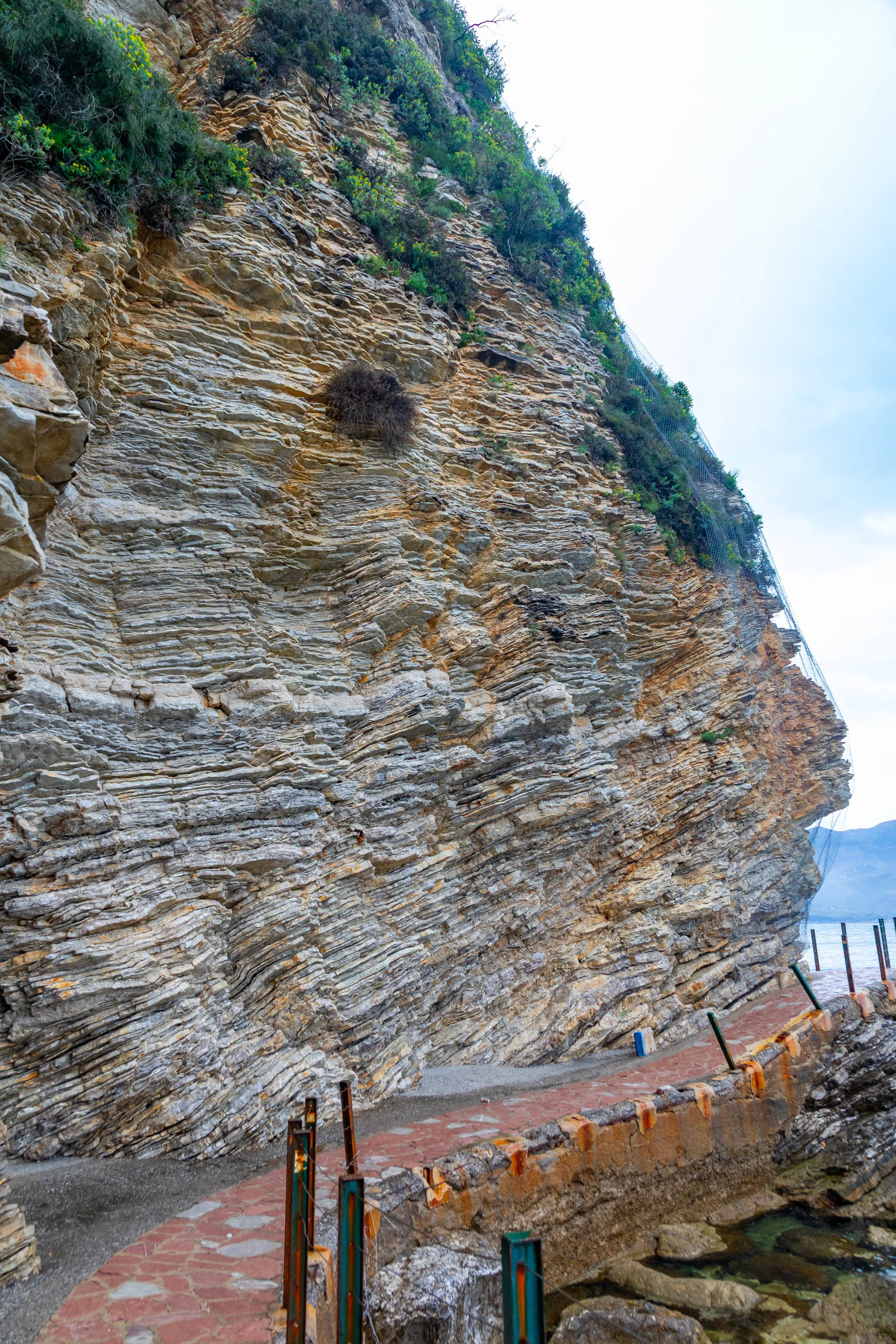  The walkway to the beach hugs the coastline 