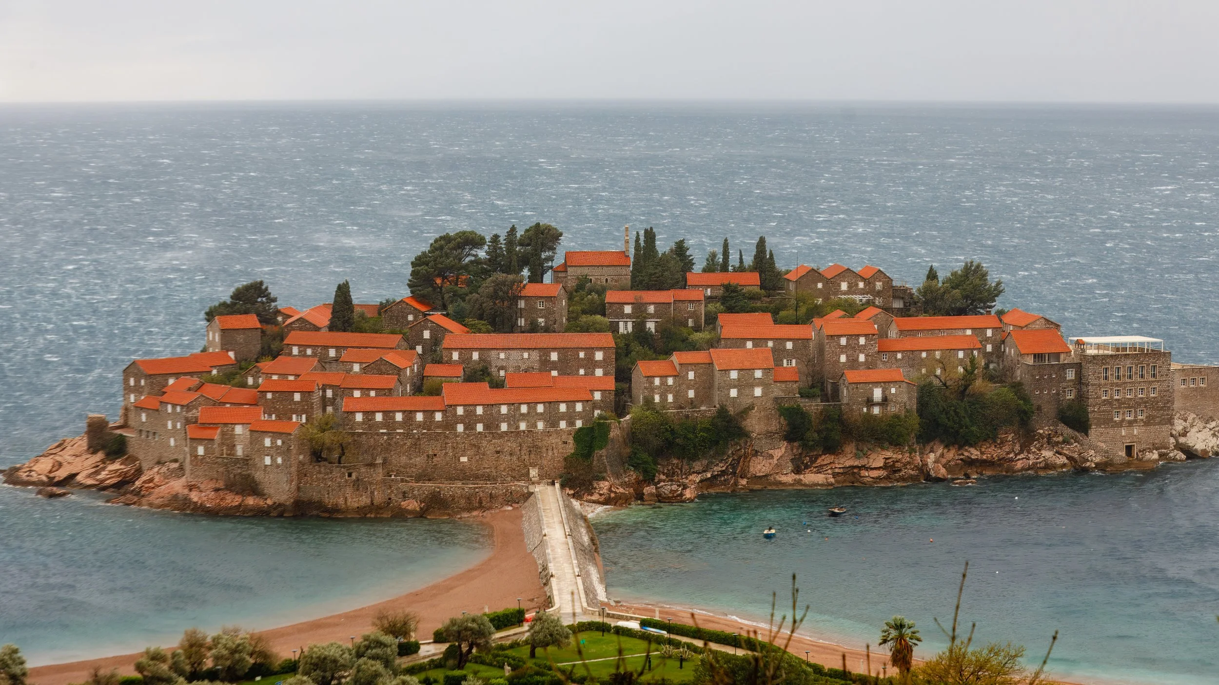  Fortified island village of Sveti Stefan, a jumble of 15th-century stone villas overlooking the Adriatic Sea,&nbsp;now a luxurious Aman resort 