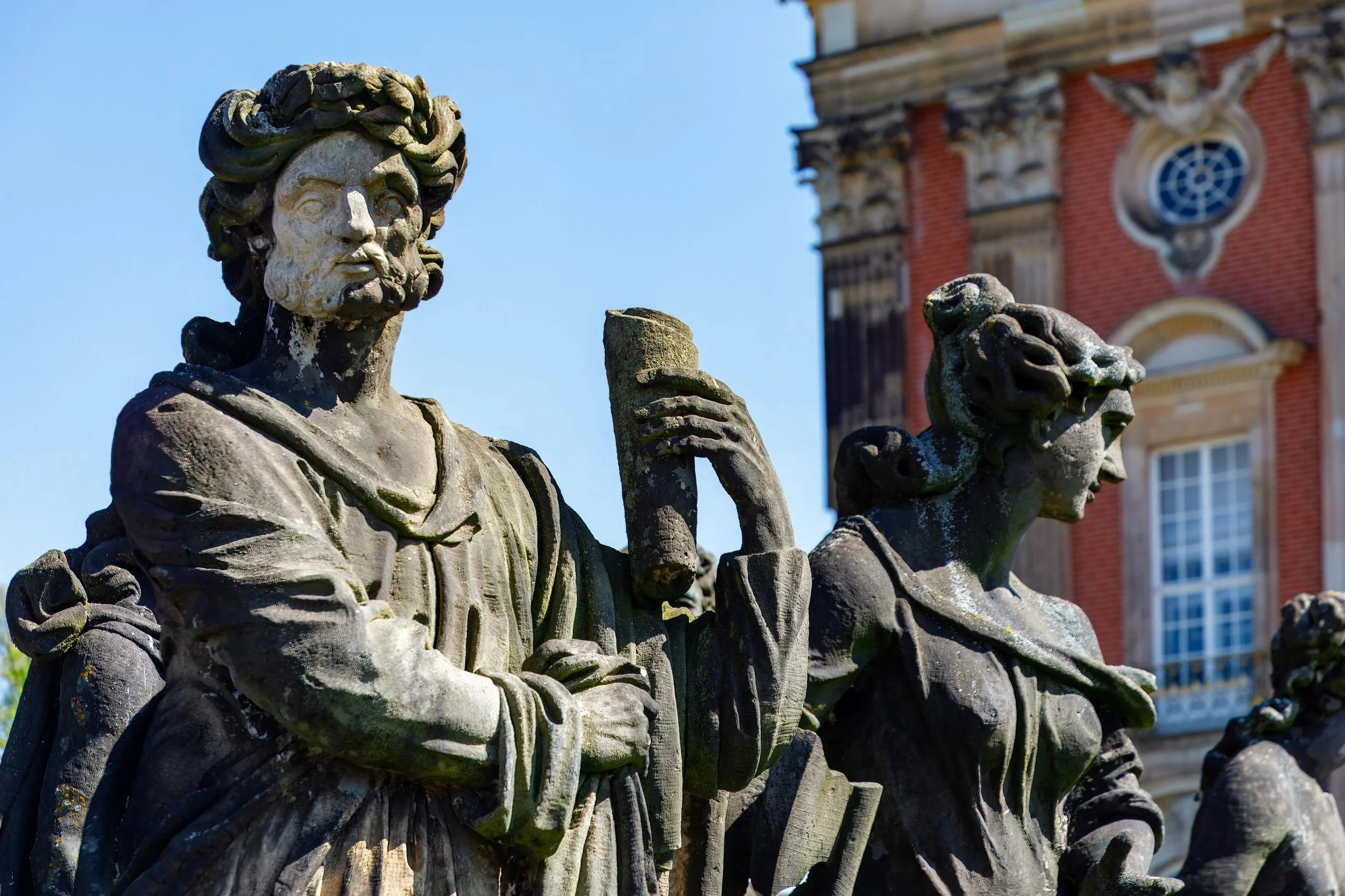  One of a number of statues in various stages of repair in the surrounding Sanssouci Park outside the castle 