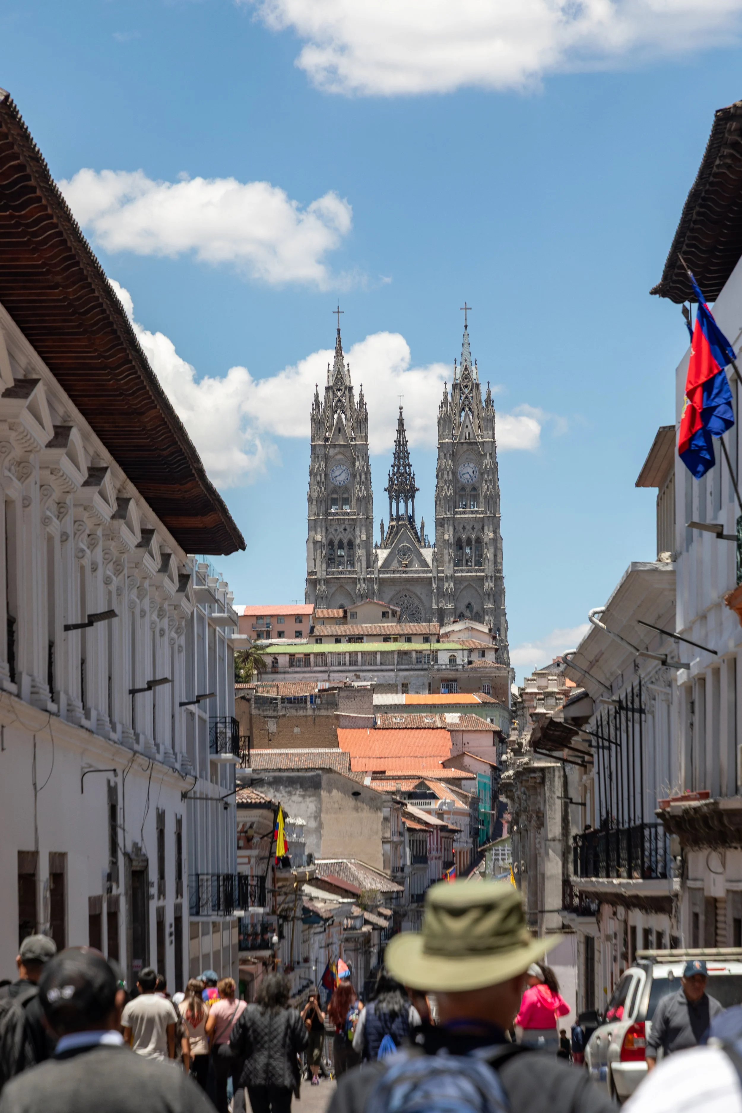  Old city street view leading to the Basílica del Voto Nacional, the largest neo-Gothic basilica in the Americas and technically still under construction since 1892 