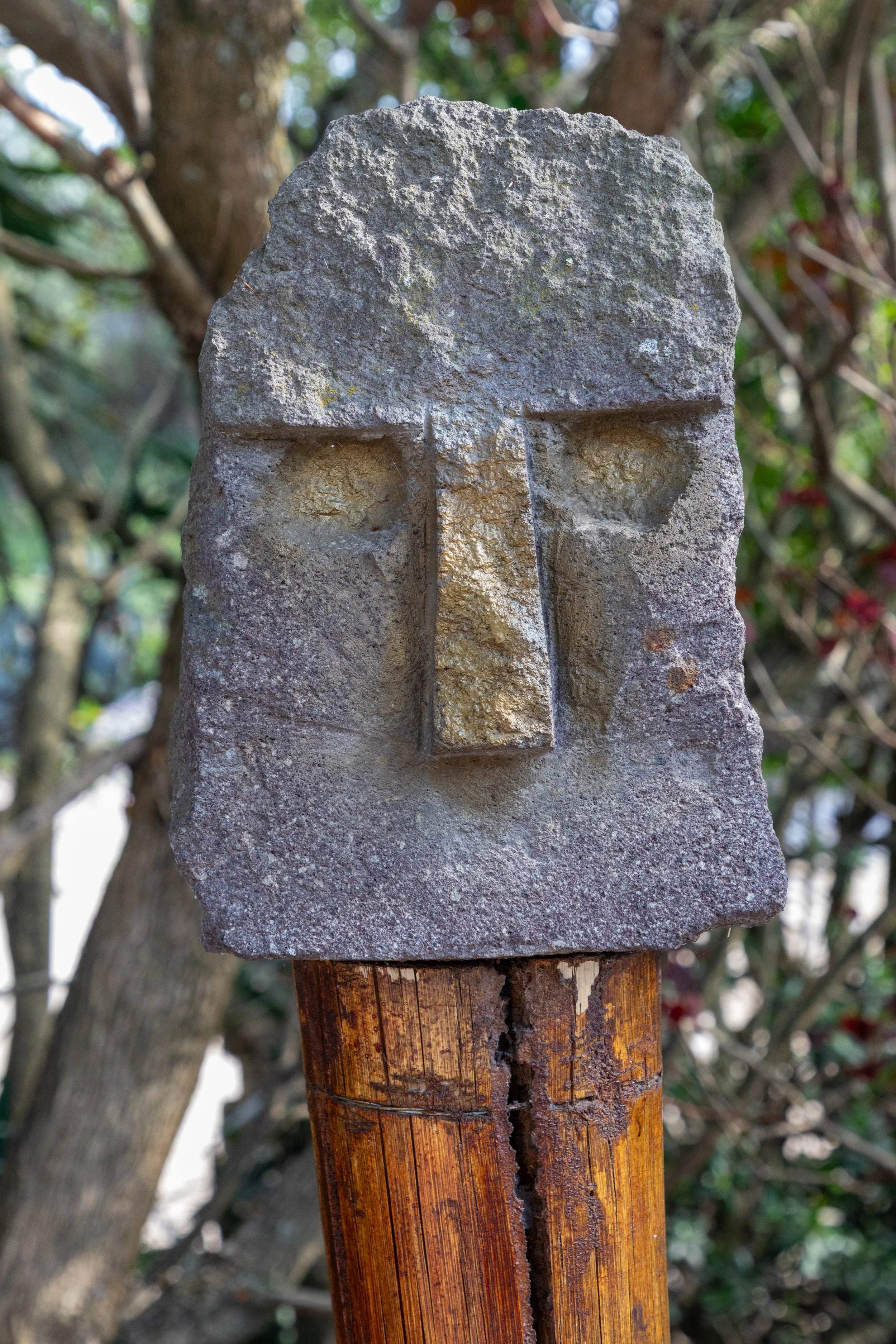  Primitive stone face sculpture 