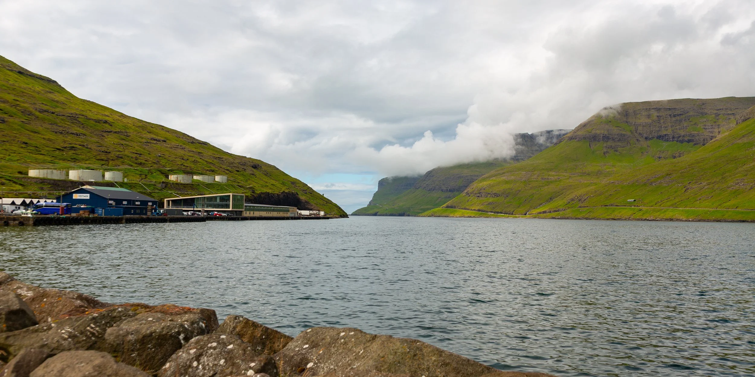  After buying tickets for our boat tour, looking across the fjord from Sørvágur 