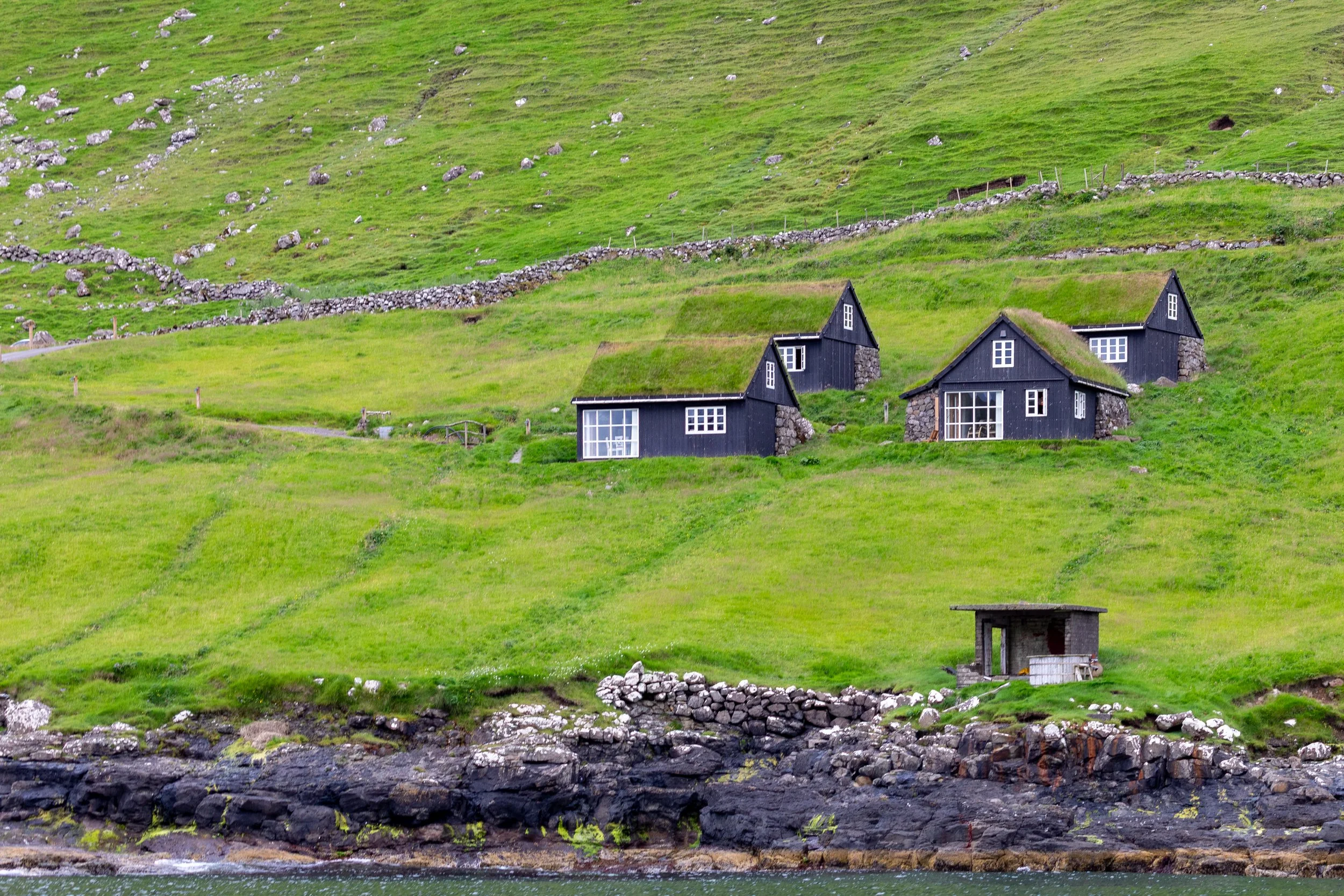  Traditional sod-roofed house along the coast 