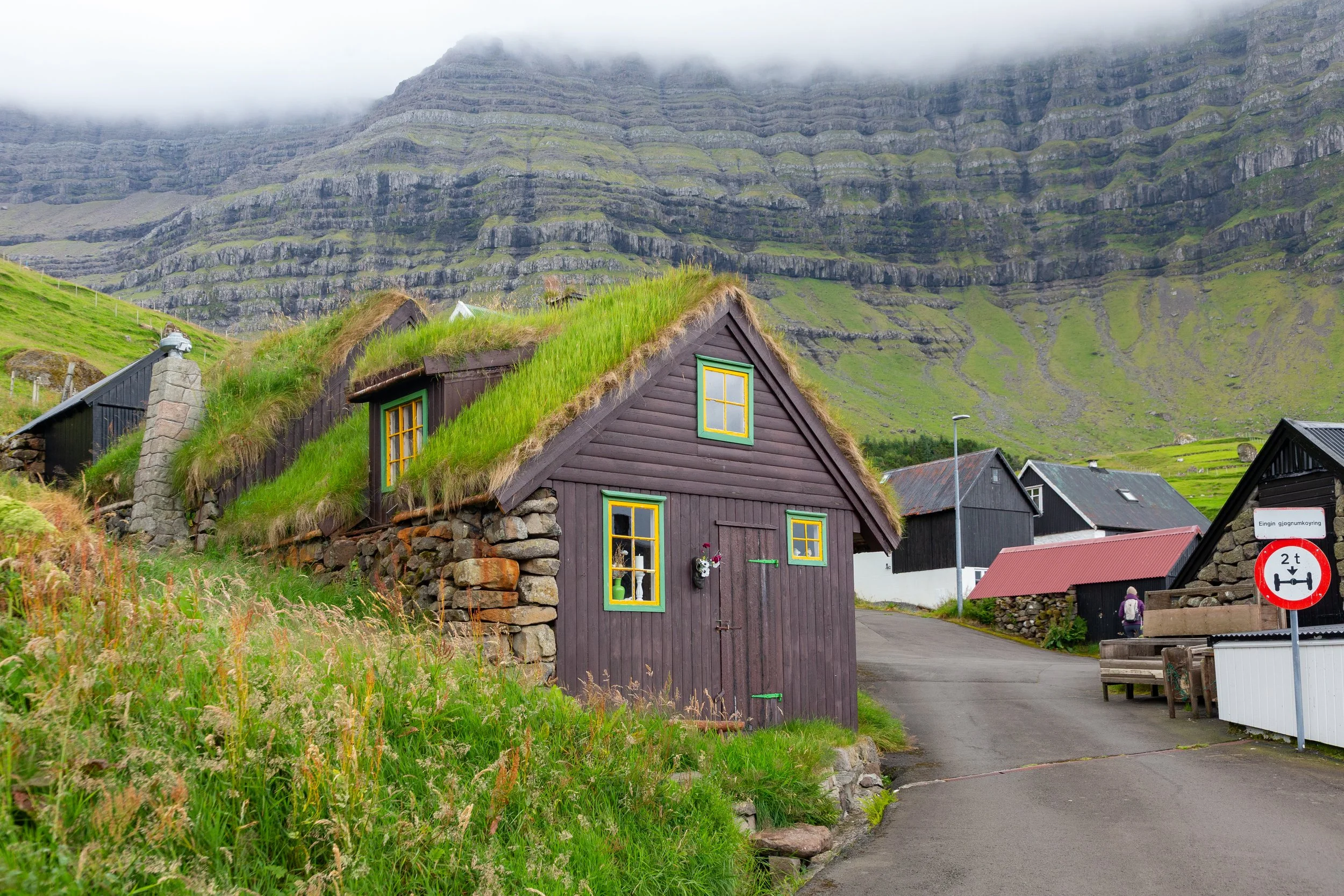  After passing by tunnel to Borðoy Island, we continued on a bridge to the smaller Kunoy island through a narrow one-lane tunnel to the small village 
