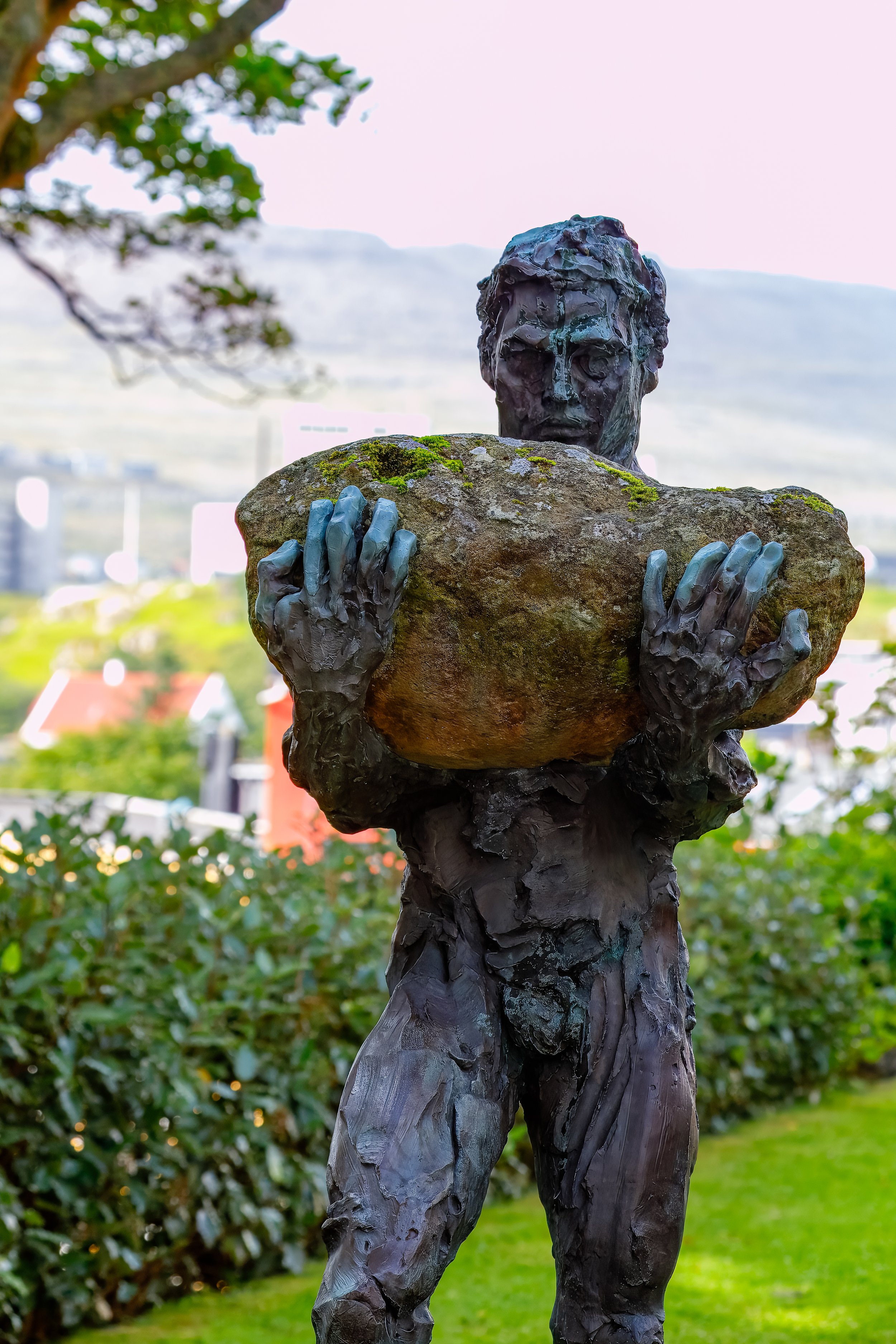  Traðarmaðurin (1889) ("The Trader"), bronze sculpture created by artist Hans Pauli Olsen as tribute to the men who cultivated small plots of land outside Tórshavn 