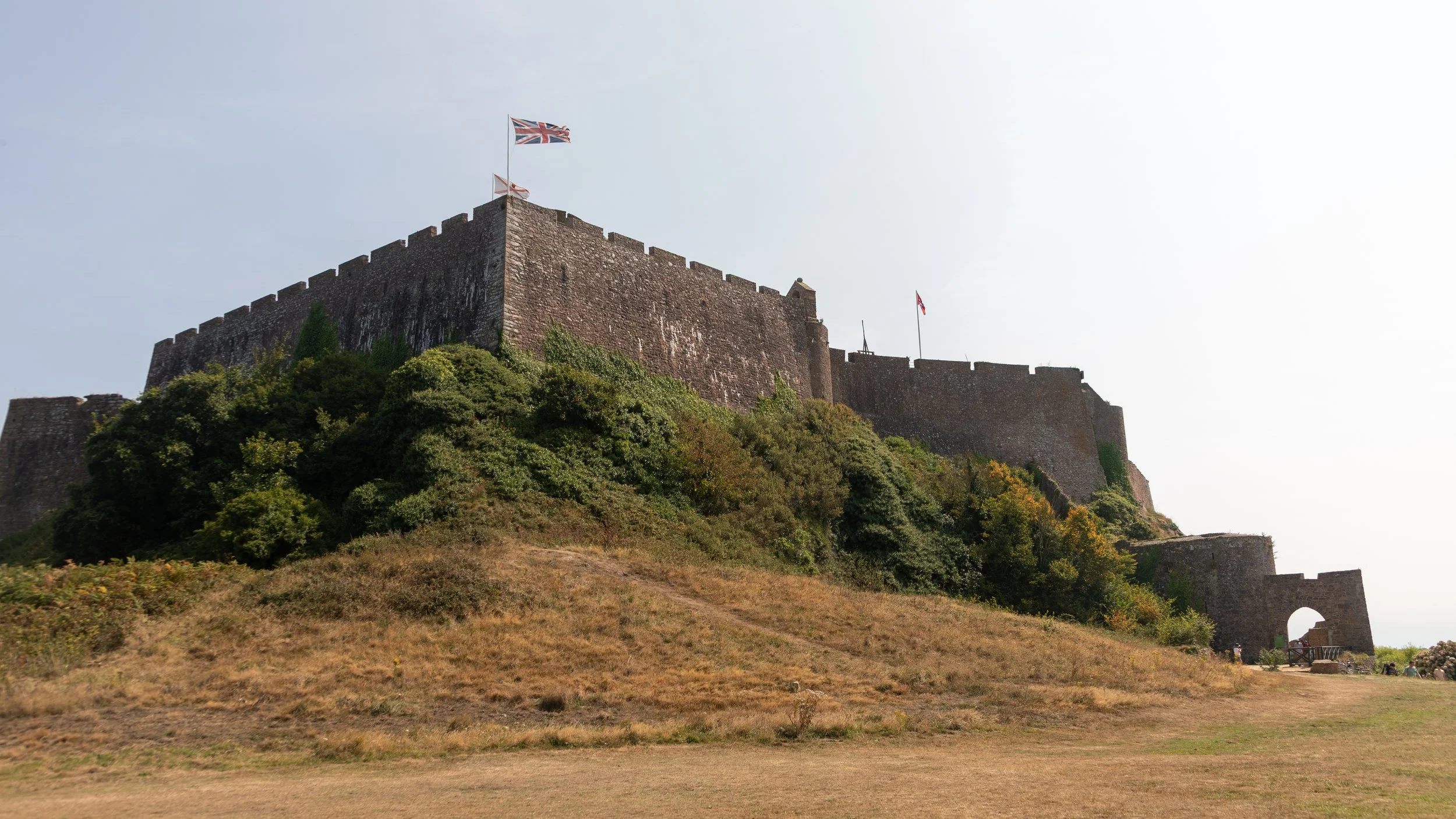  Looking up at the castle walls of Mont Orgueil 