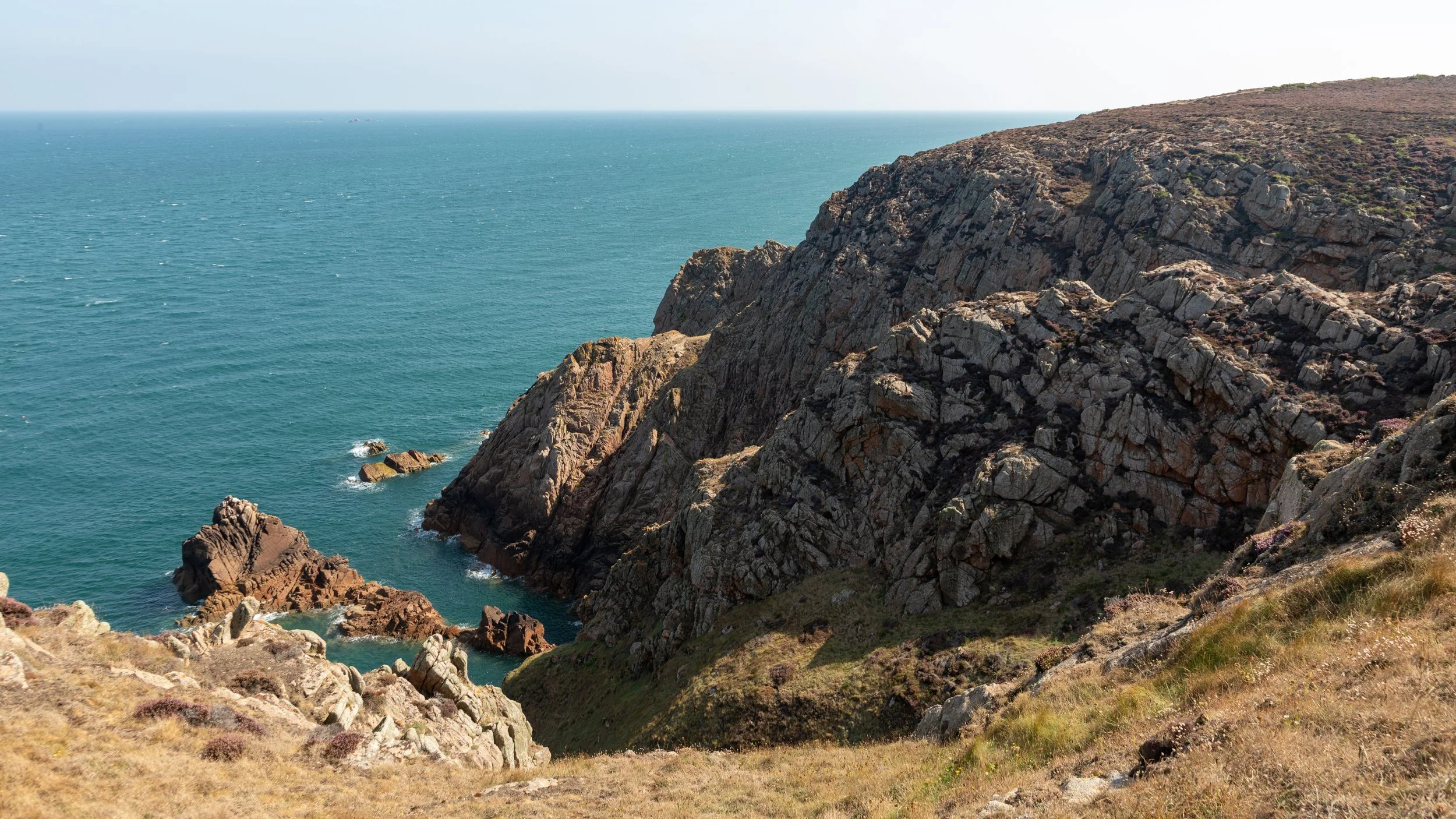  The very rocky coast with the strong winds off the north Atlantic do not support much vegetation, despite the relatively warm climate 