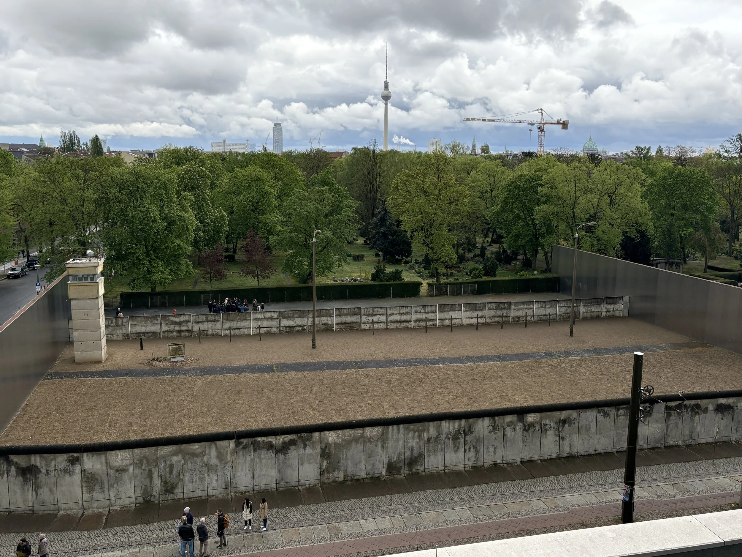  From the nearby Documentation Centre we get a birds eye view of the remaining guard tower and the inner and outer wall  