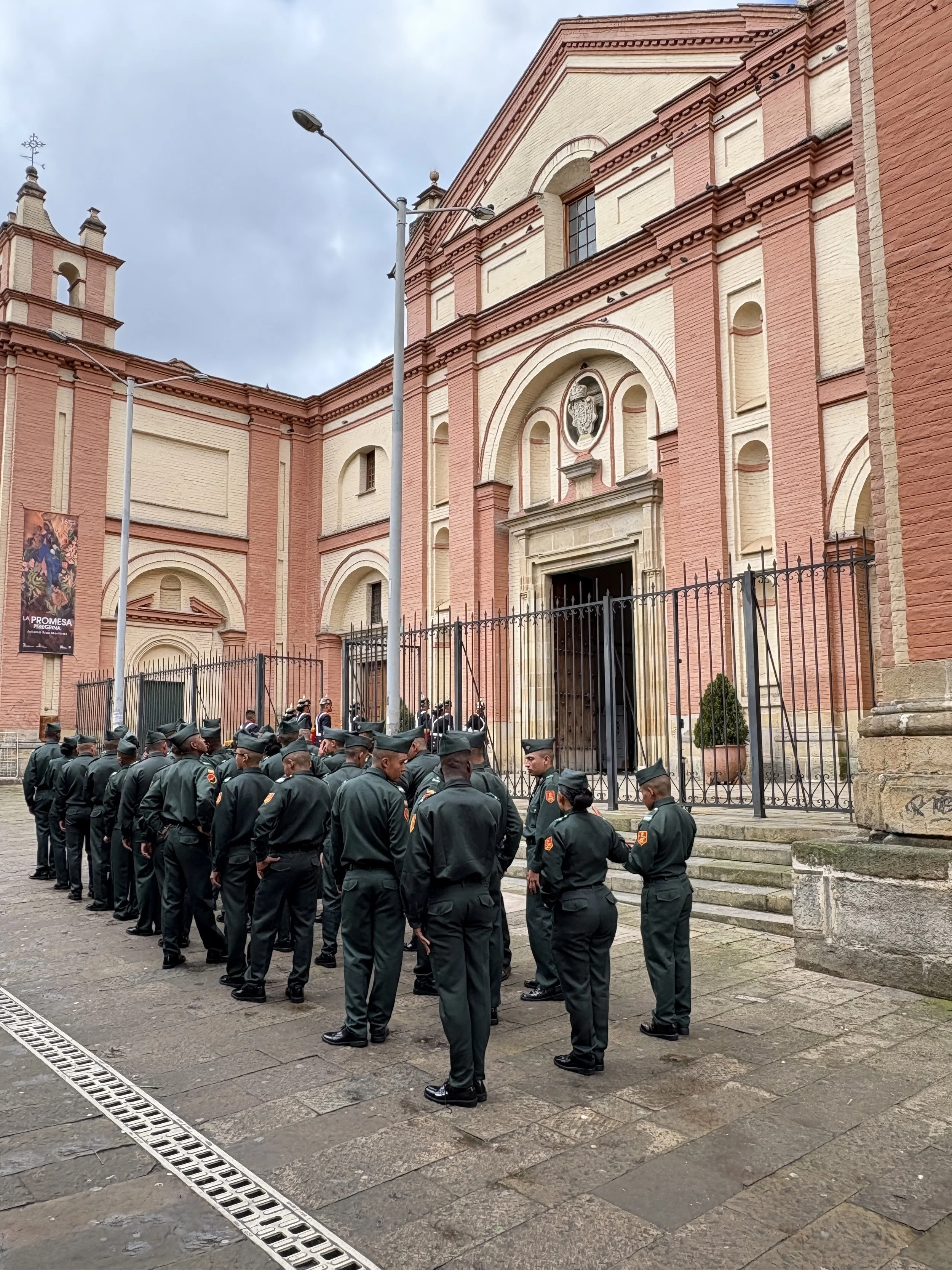  Church of San Ignacio (1635) with soldiers lined up for a morning prayer 