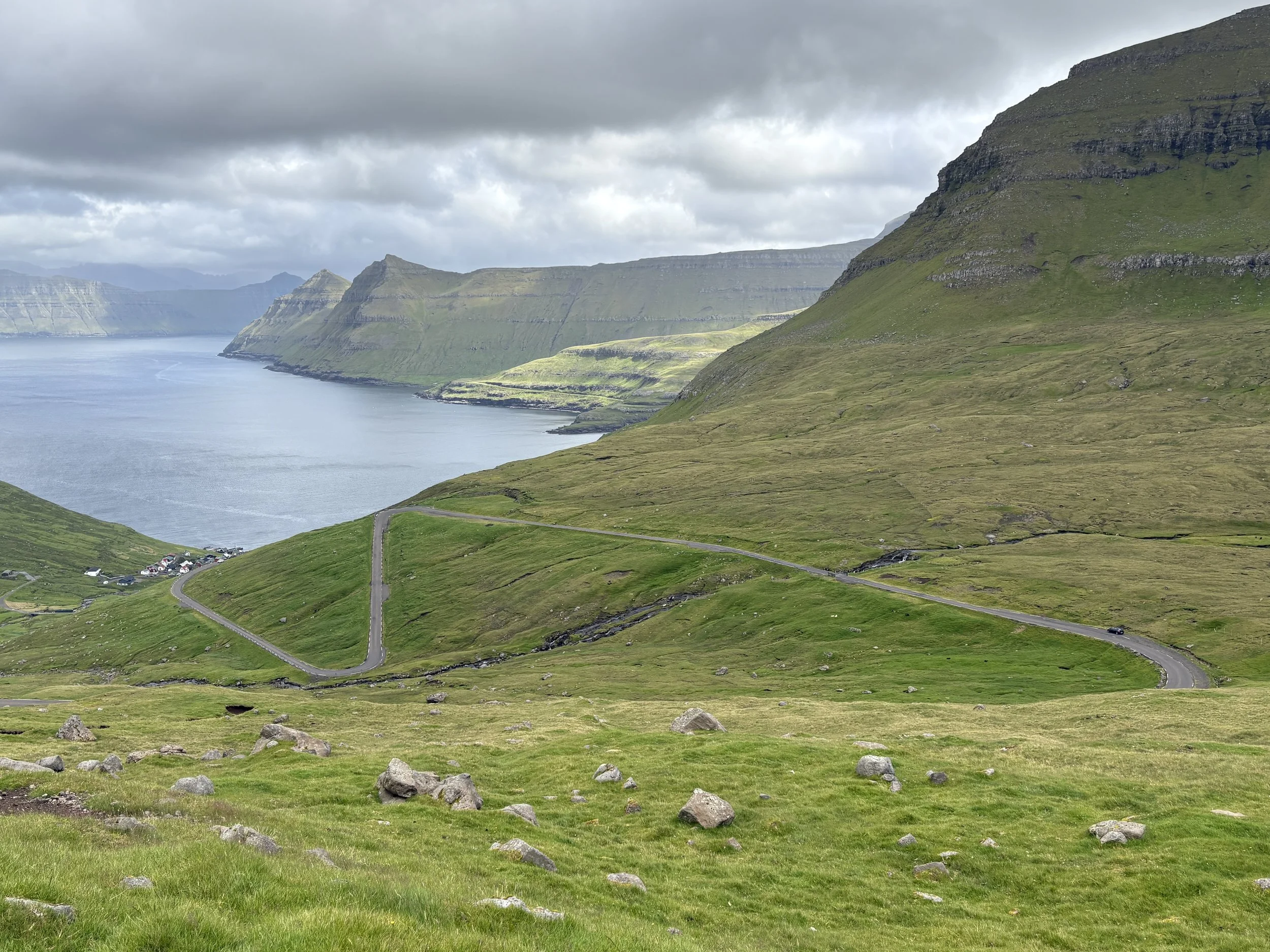  A more traditional view of the Funningsvegur road leading the town of Funningur 