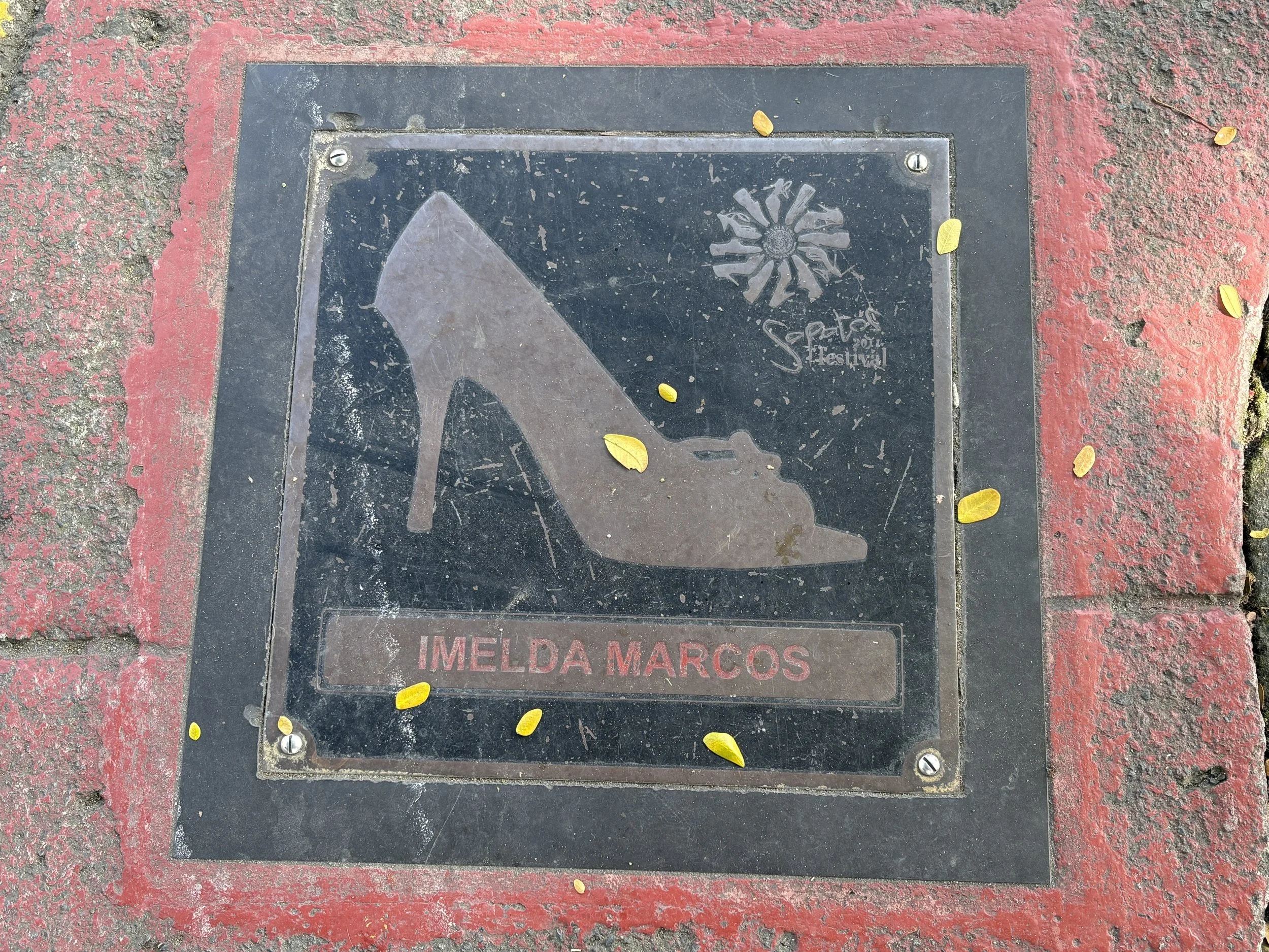  Sidewalk plaque outside the museum  