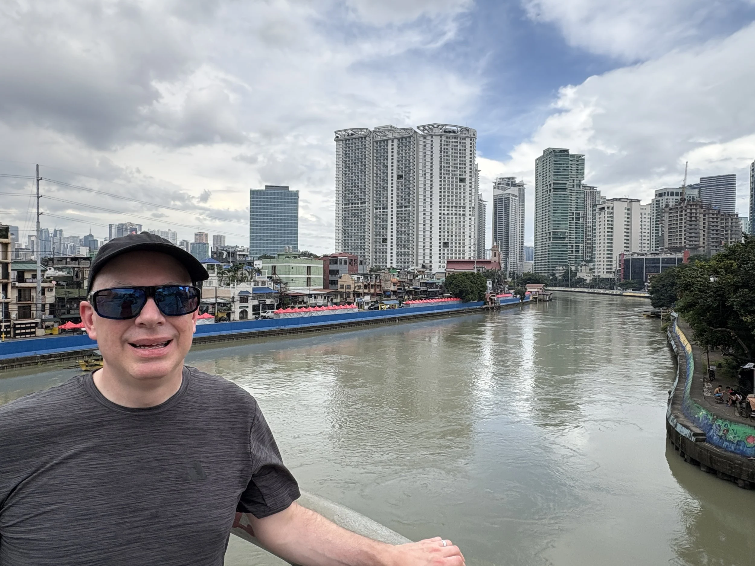  Walking along the Pasig River with Mandaluyong in the background 