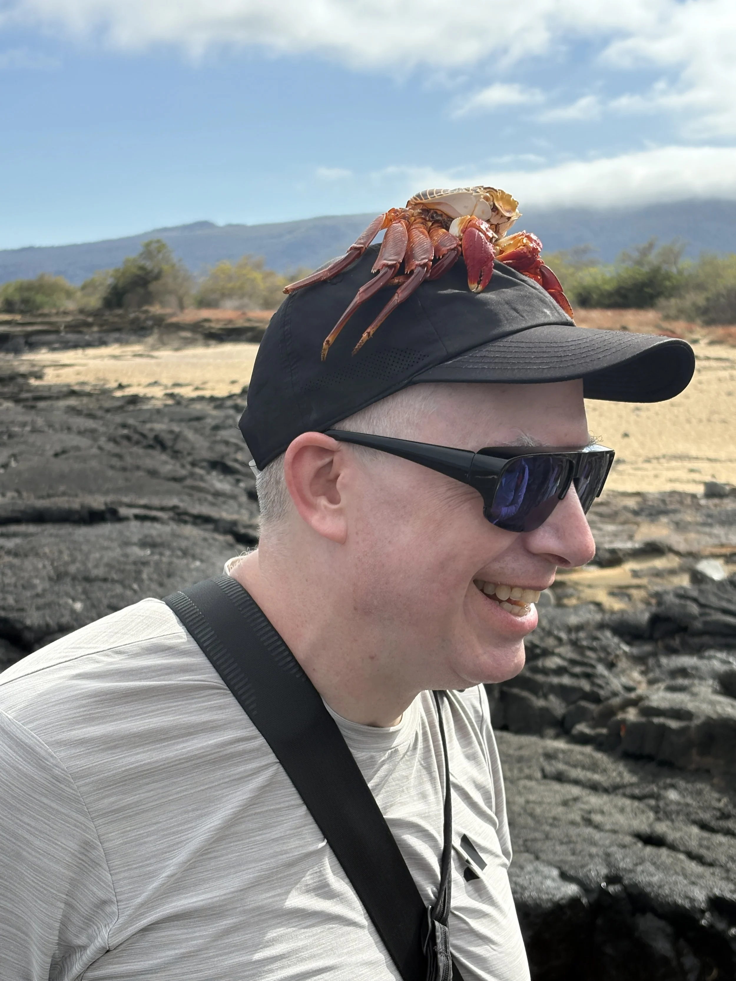  With the original crab having moved onto a bigger home, the guide borrowed the abandoned shell for a temporary hat 
