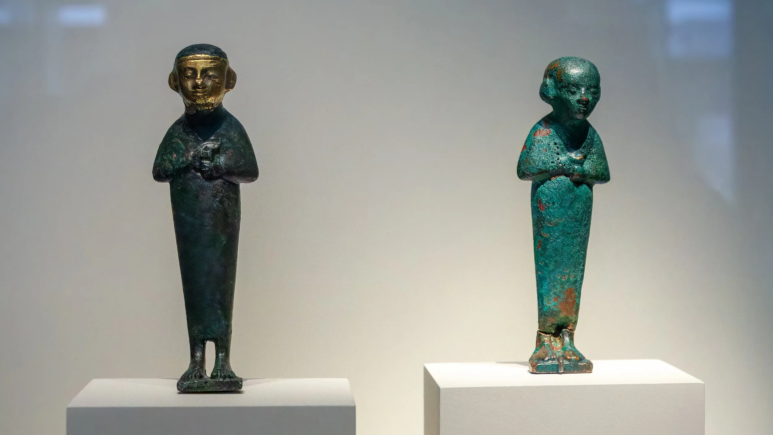  7th Century BC Bronze statuettes, likely representing the Priest of Cádiz (left) and the Egyptian god Ptah 