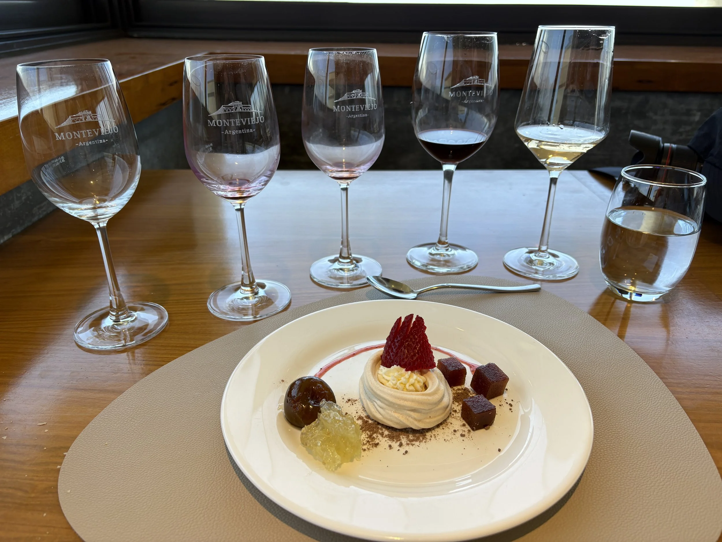  Having made it to our fifth course, we were tasting our fifth wines.  As Tom had to drive, I finished about half of his wine in addition to mine. 