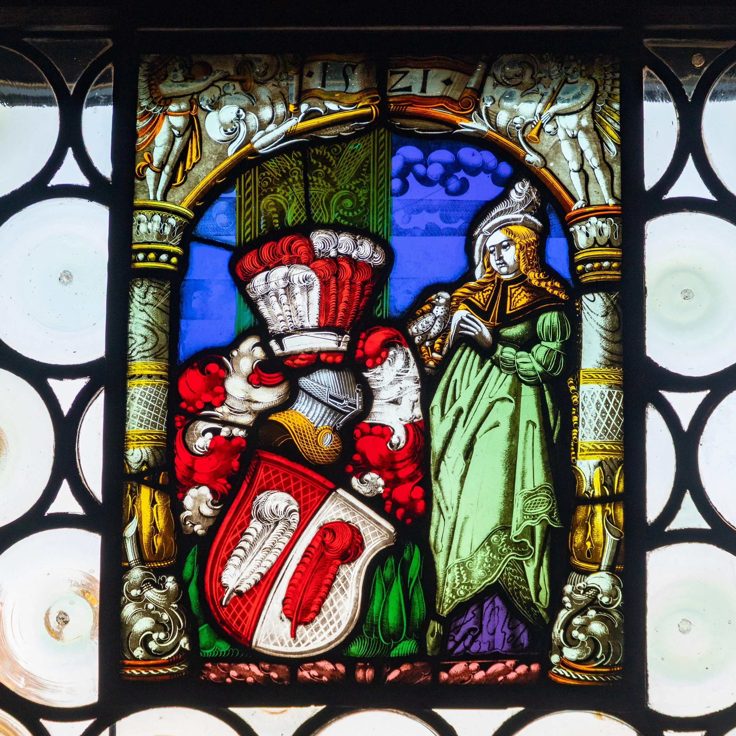  Stained glass elements in a reconstructed medieval cloister; one of many religious artifacts gathered in the national museum 