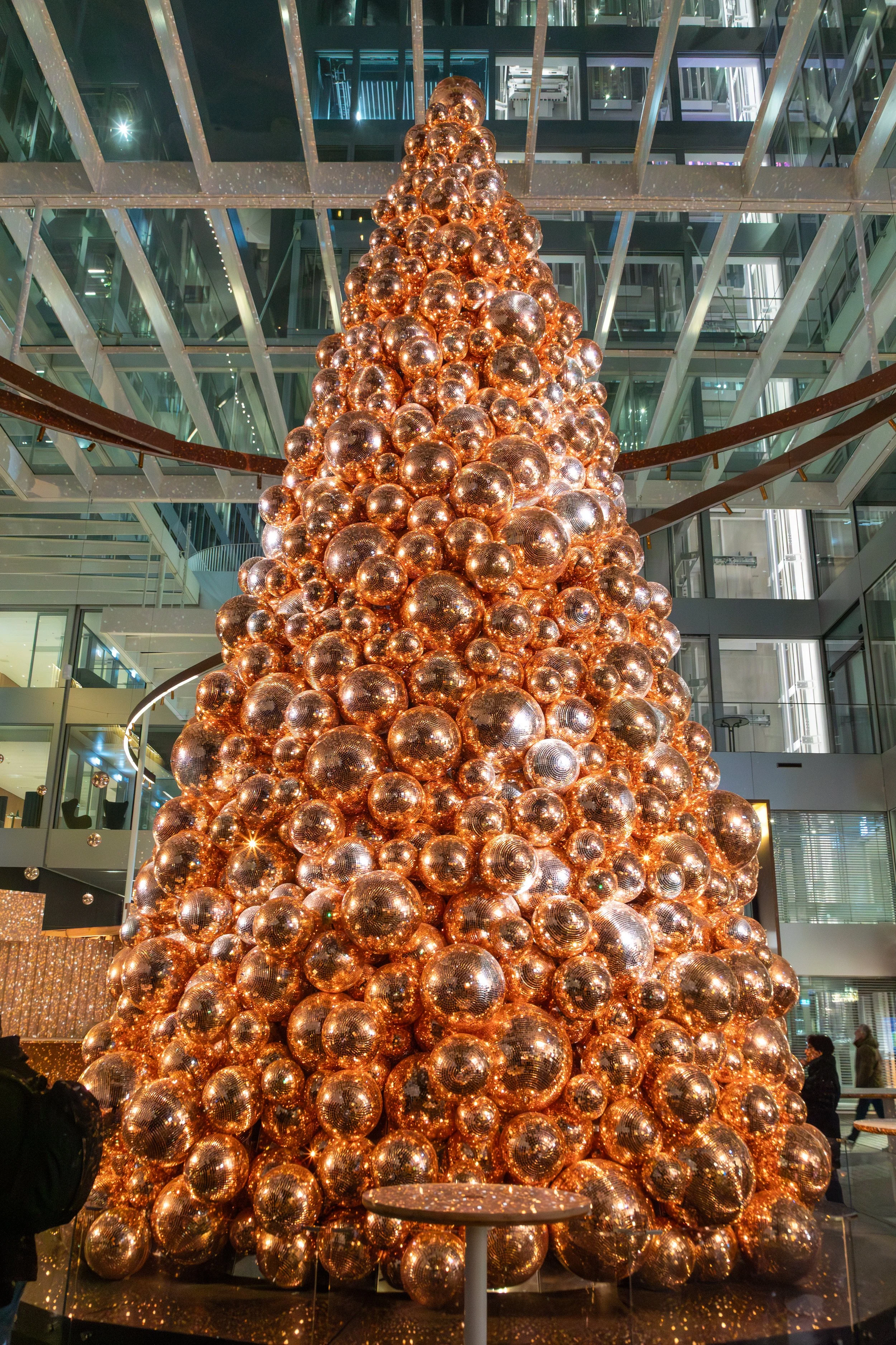  Christmas tree accents a small market at the The Circle complex, where our hotel was located 