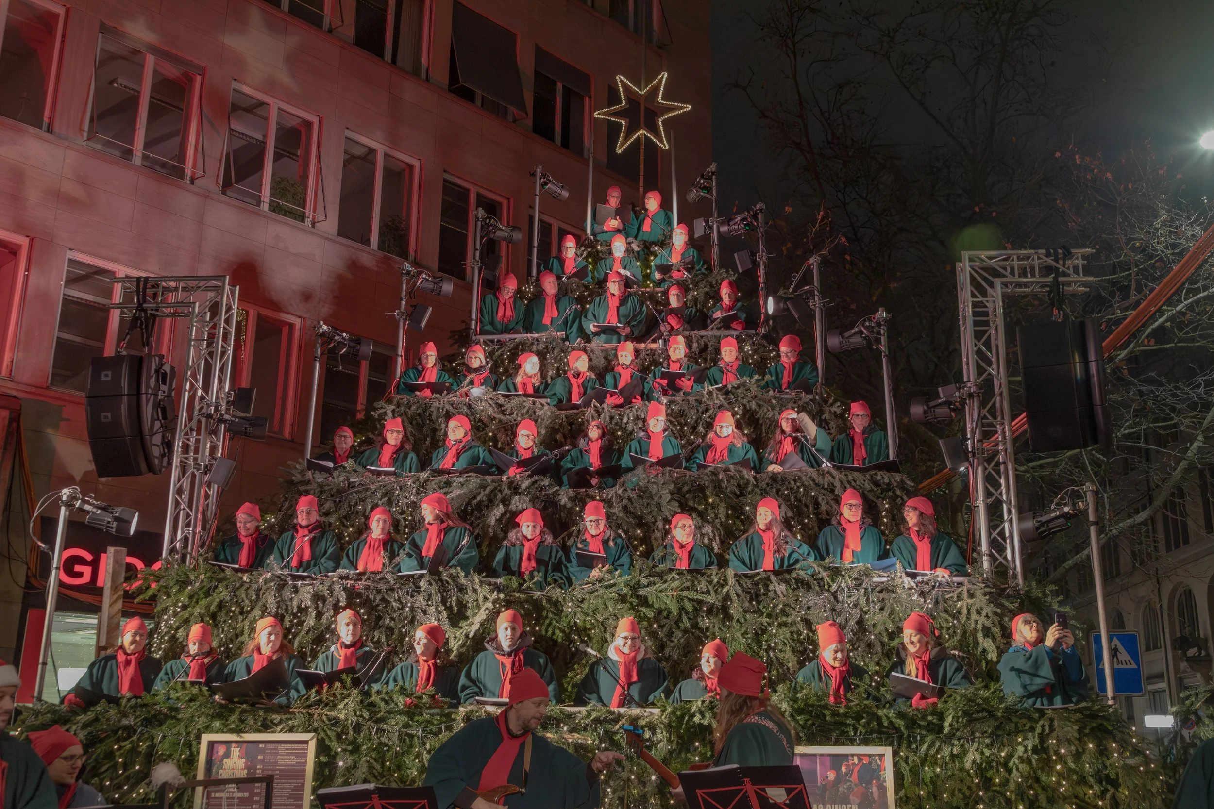  Werdmühleplatz features Zurich’s unique singing Christmas tree; a pine-lined scaffolding filled with carolers performing throughout the season 
