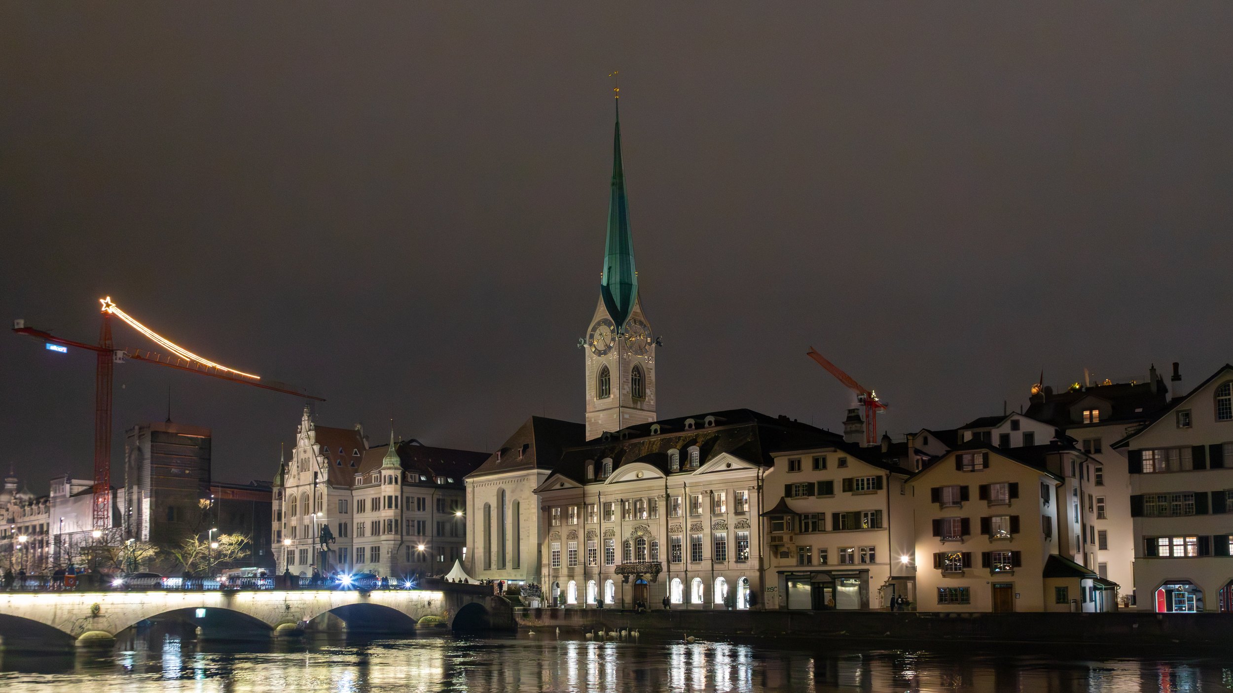  The Fraumünster Church and its distinctive green spire dominates the skyline from across the Limmat River 