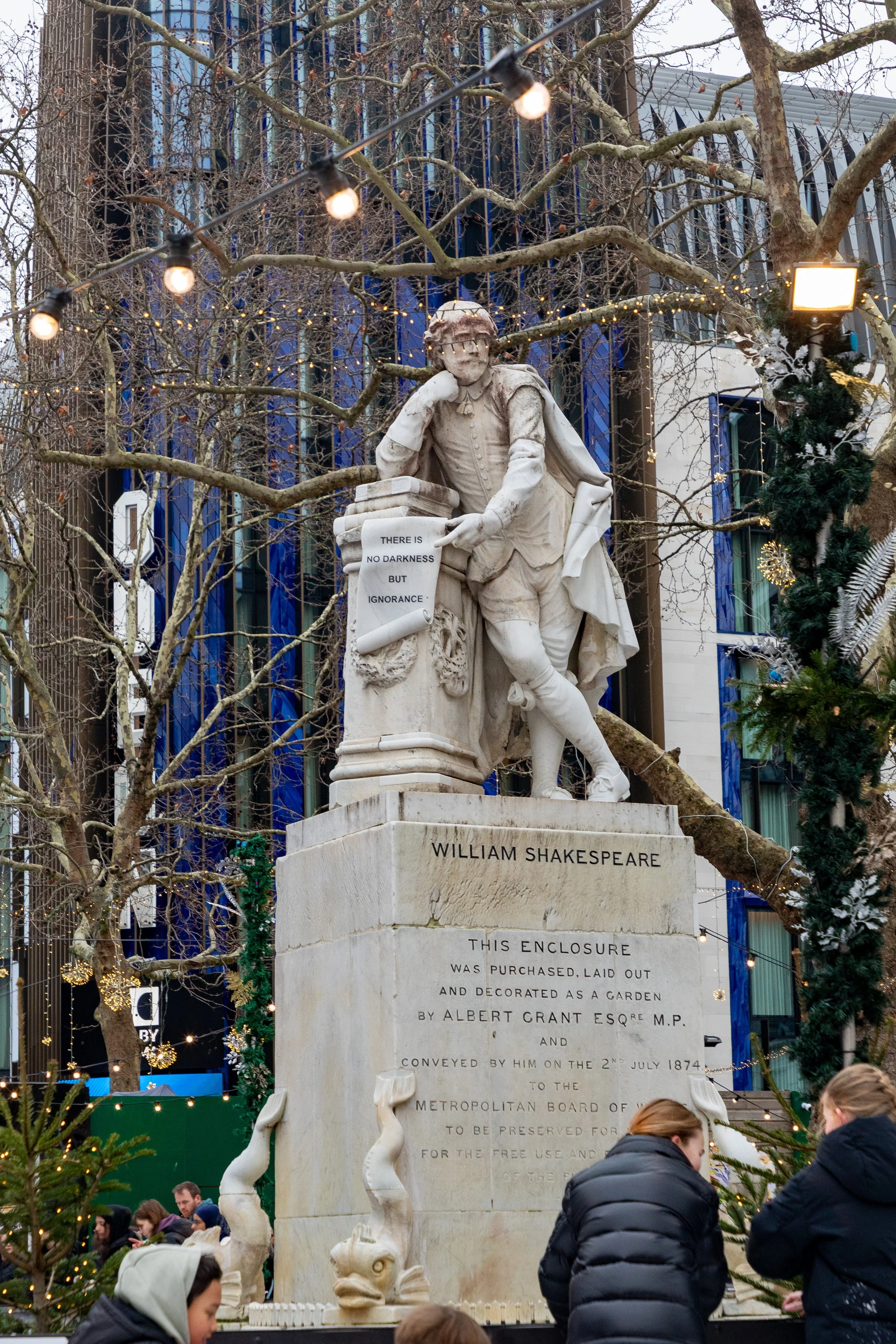  Marble statue of William Shakespeare in the centre of Leicester Square 