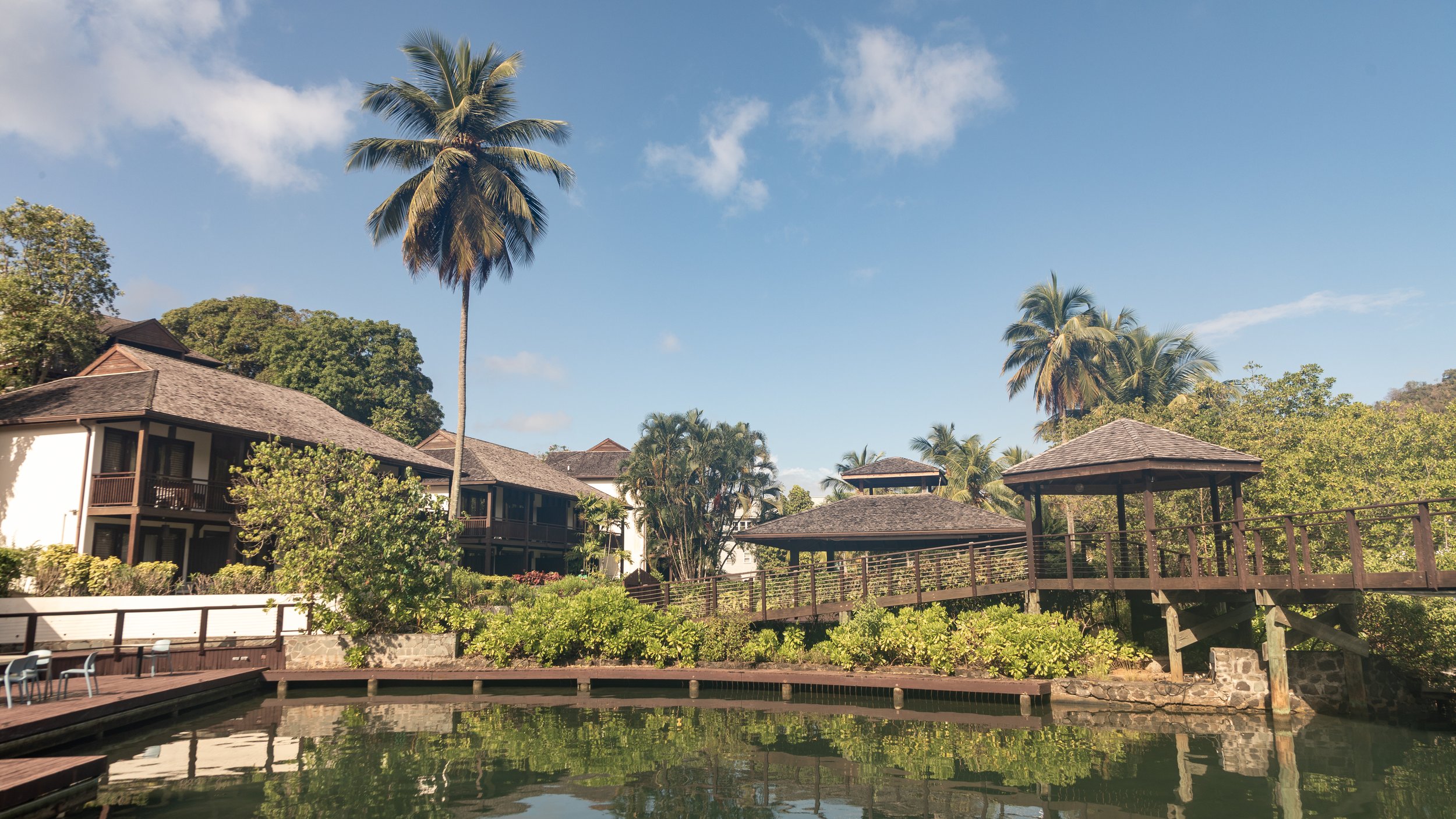  The resort had a number of small bungalows climbing the hillside out of the harbour.  Our room was on the lower level of the building on the left. 