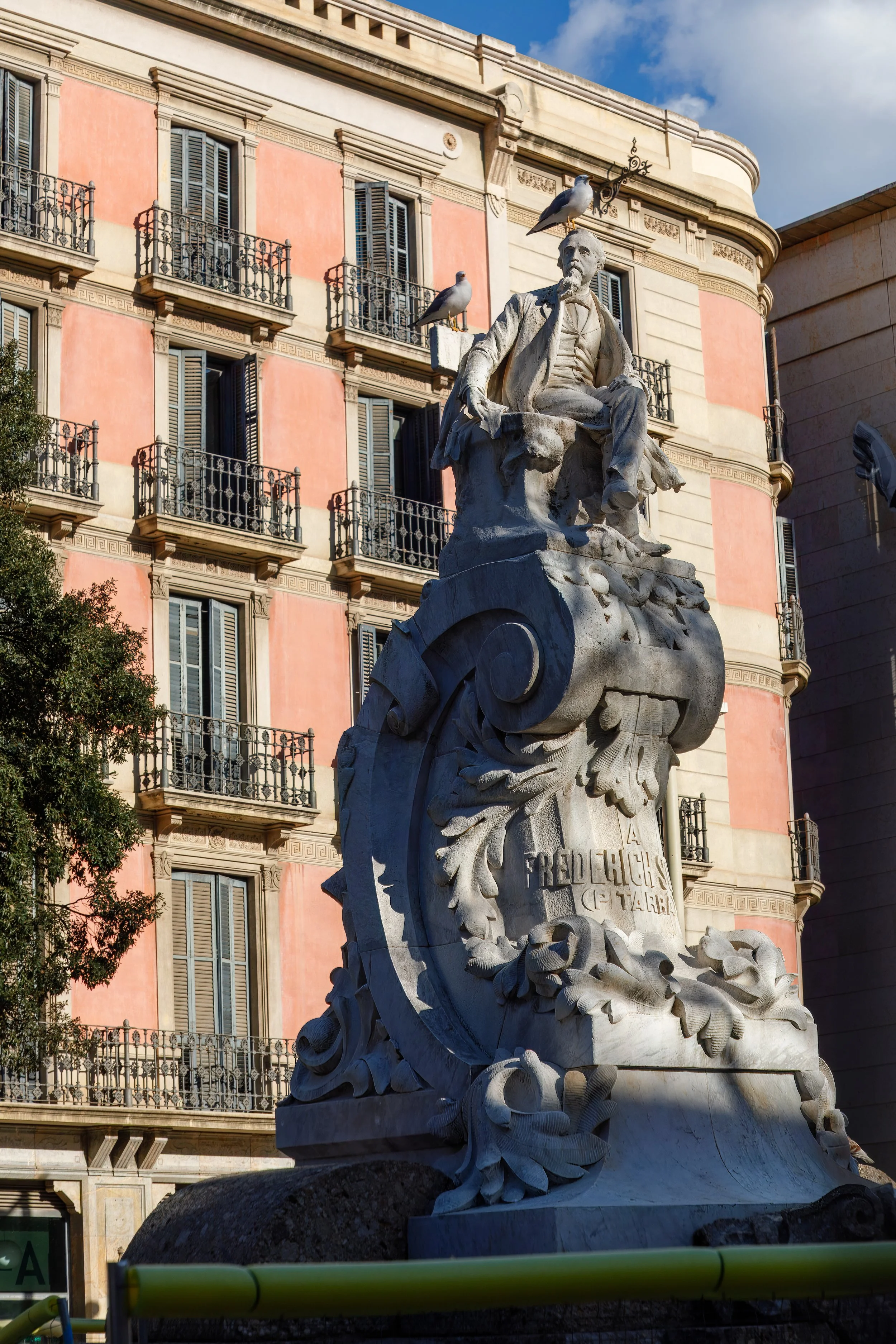  The Monument to Frederic Soler i Hubert, in Plaça del Teatre, honors Frederic Soler (1839–1895), a prominent Spanish and Catalan poet 