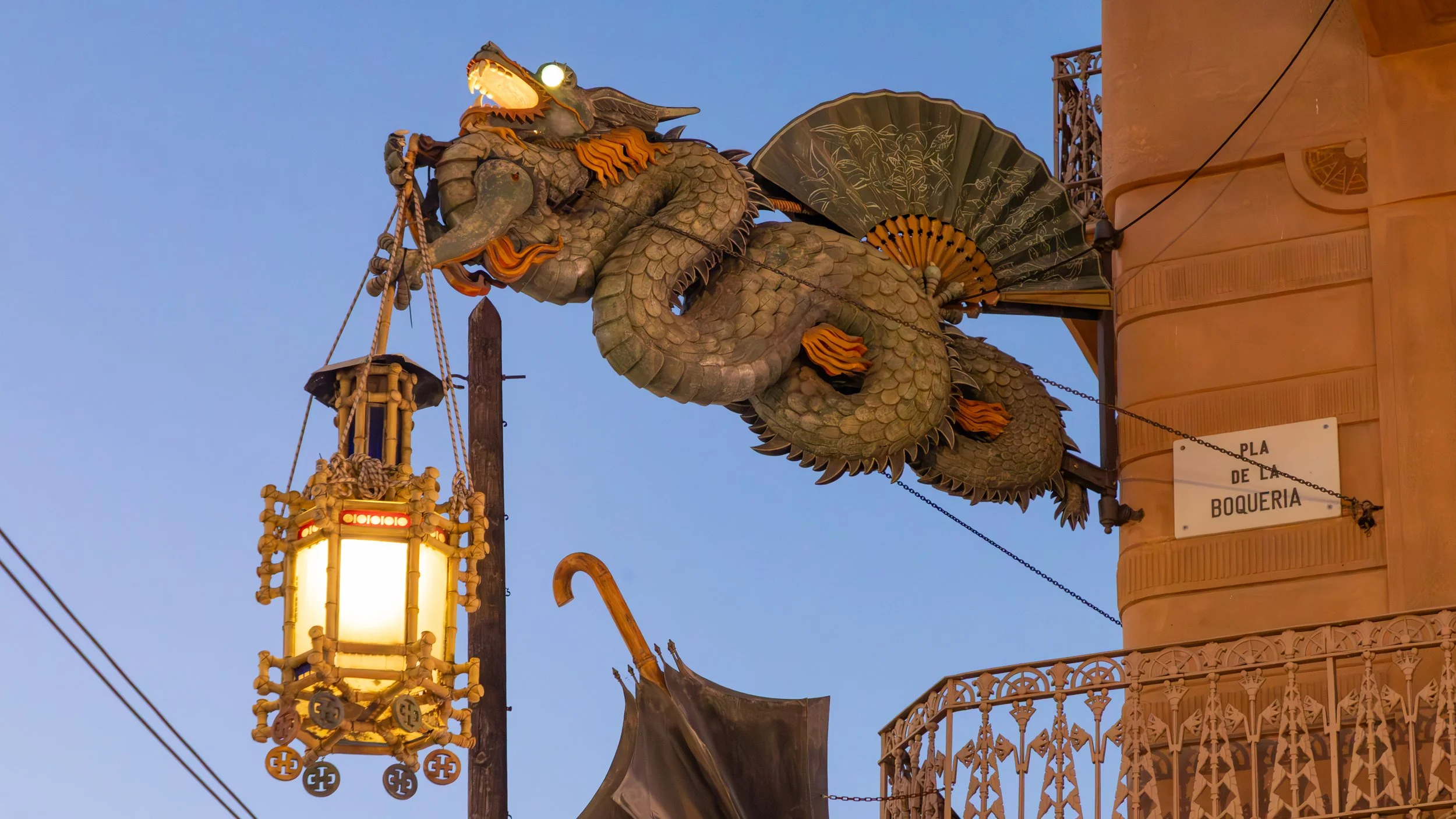  At Plaça de la Boqueria, a former umbrella shop is decorated by a Chinese dragon, a symbol of Catalan Pride 