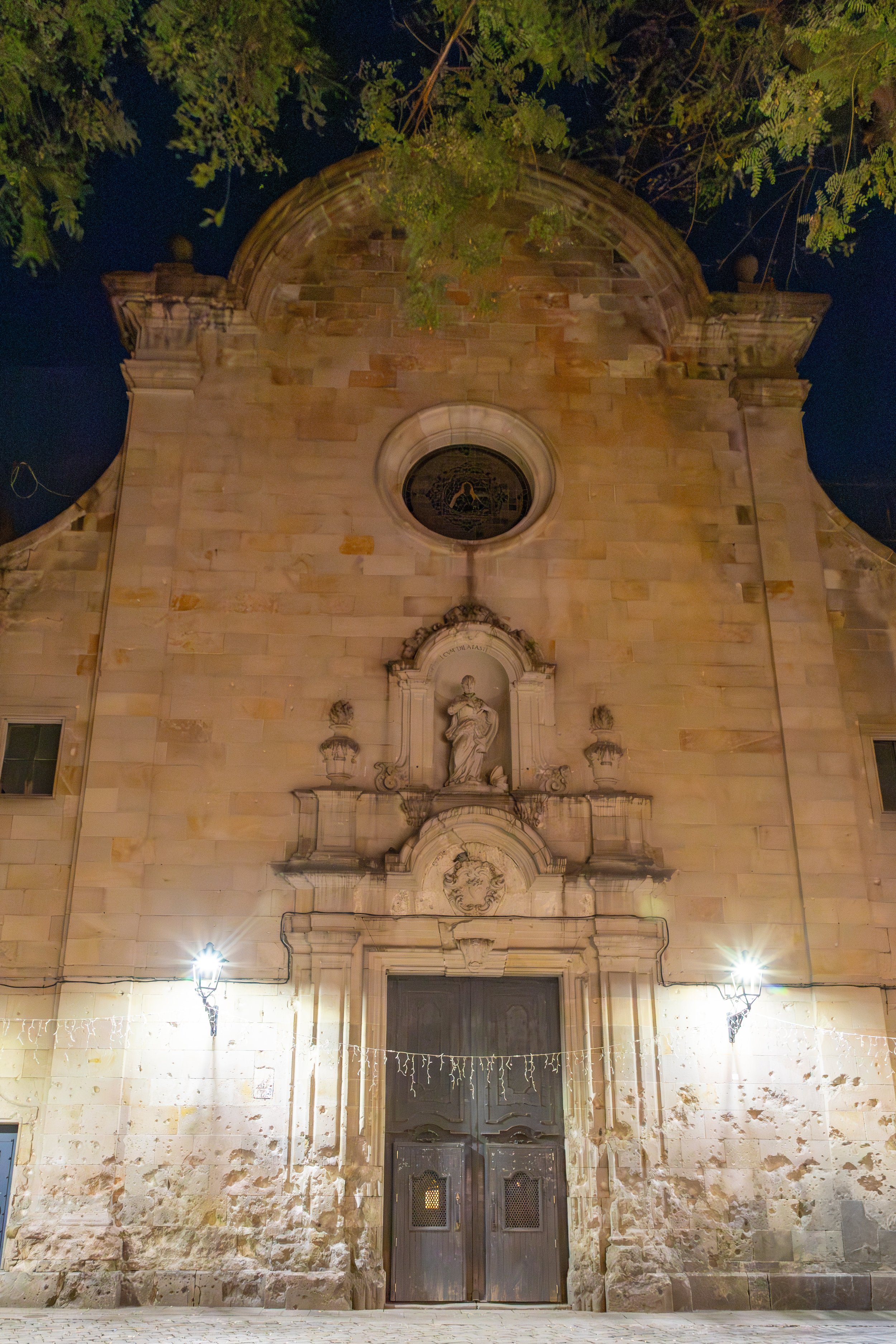  The Church of Sant Felip Neri still pocked with 1938 bomb damage from the Spanish Civil War, including a monument to 42 (mostly children) killed from an aerial bombardment 