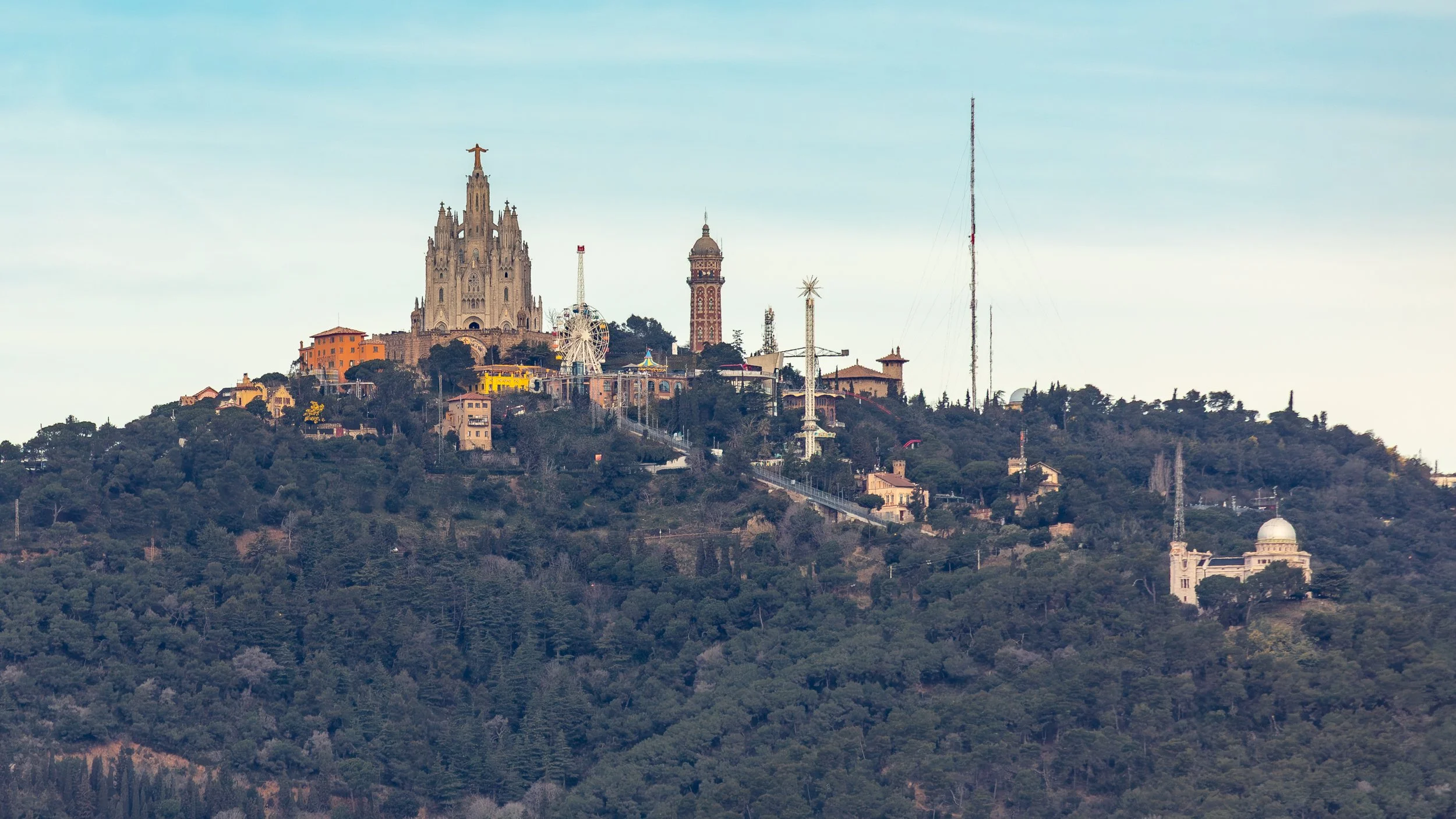  With the aid of a telephoto lens looking across the city to 512m Tibidabo Mountain 