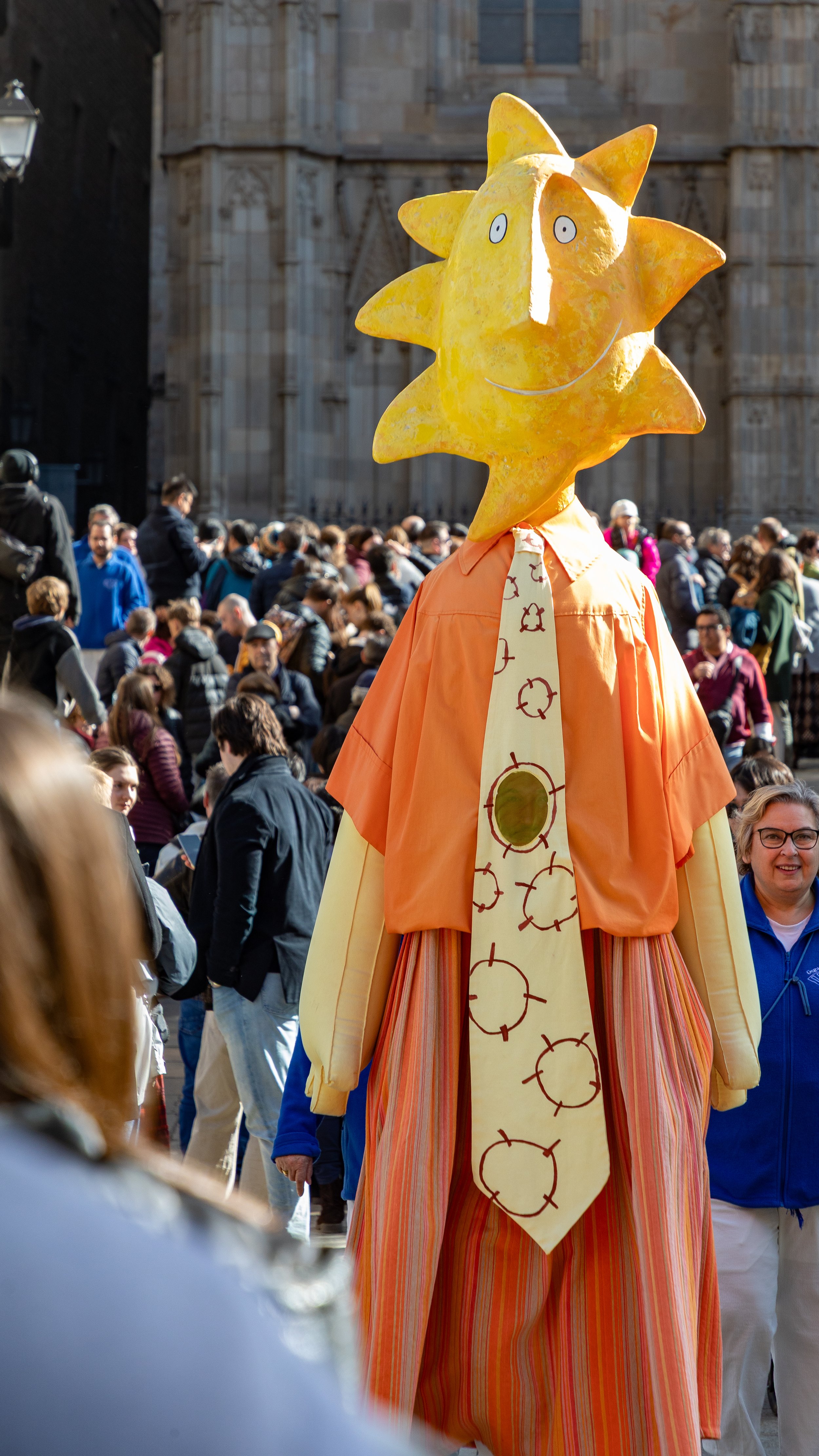  Last Gegants of the procession navigates the crowd with their guide 