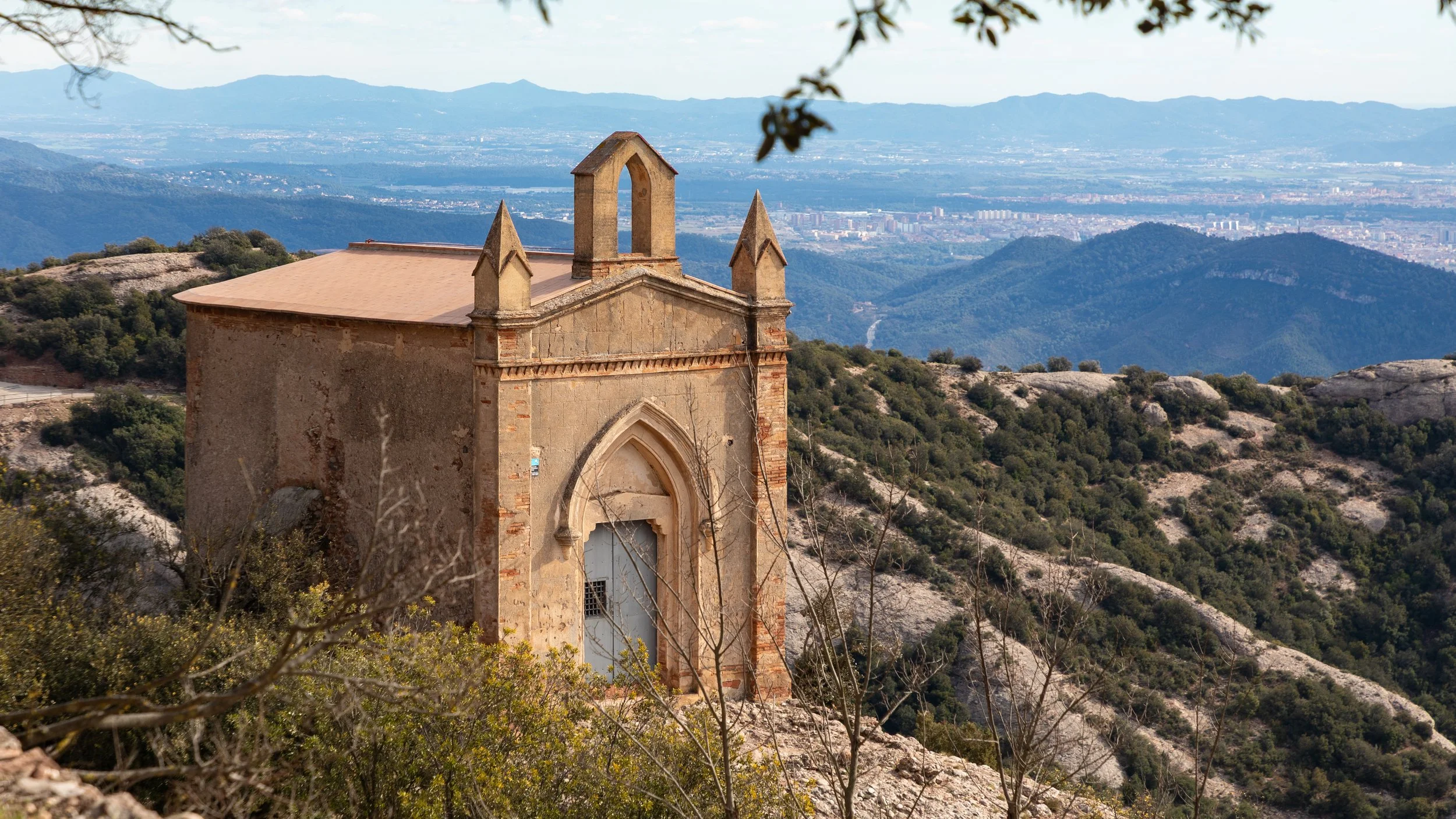  Sant Joan Chapel, with Barcelona’s sprawling suburbs in the background 