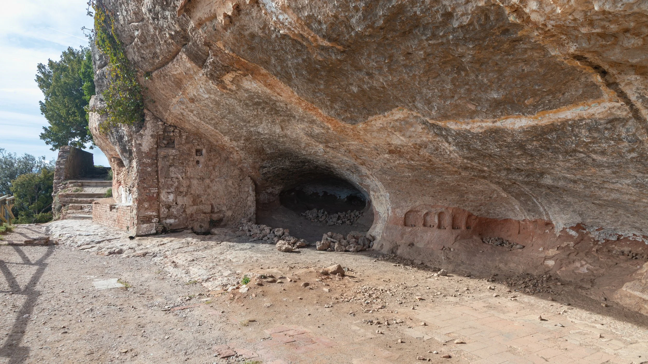  Ruins of more of the buildings cut into the mountainside  