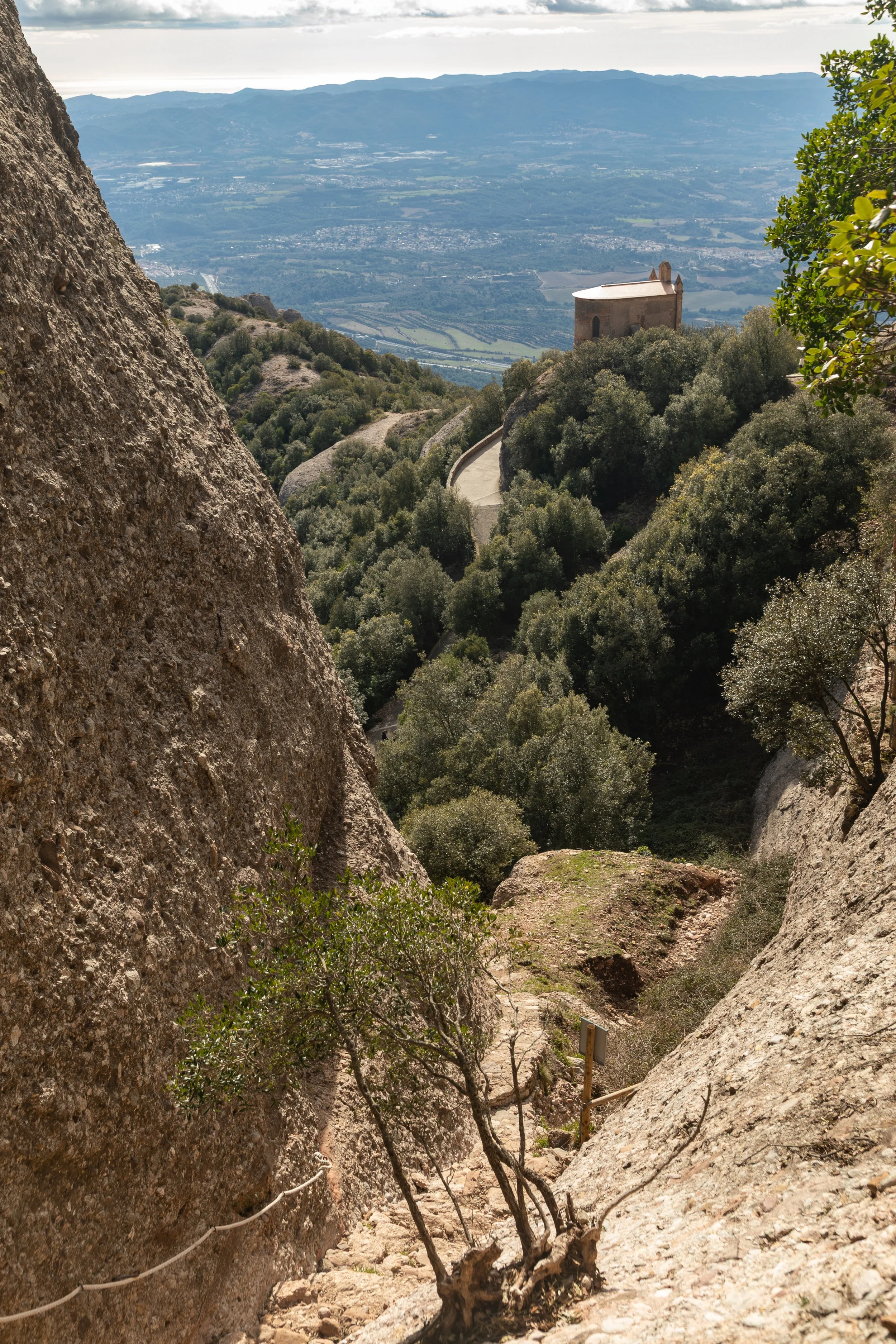  Hiking our way up the hillside, looking back at the chapel with the Mediterranean coastline 